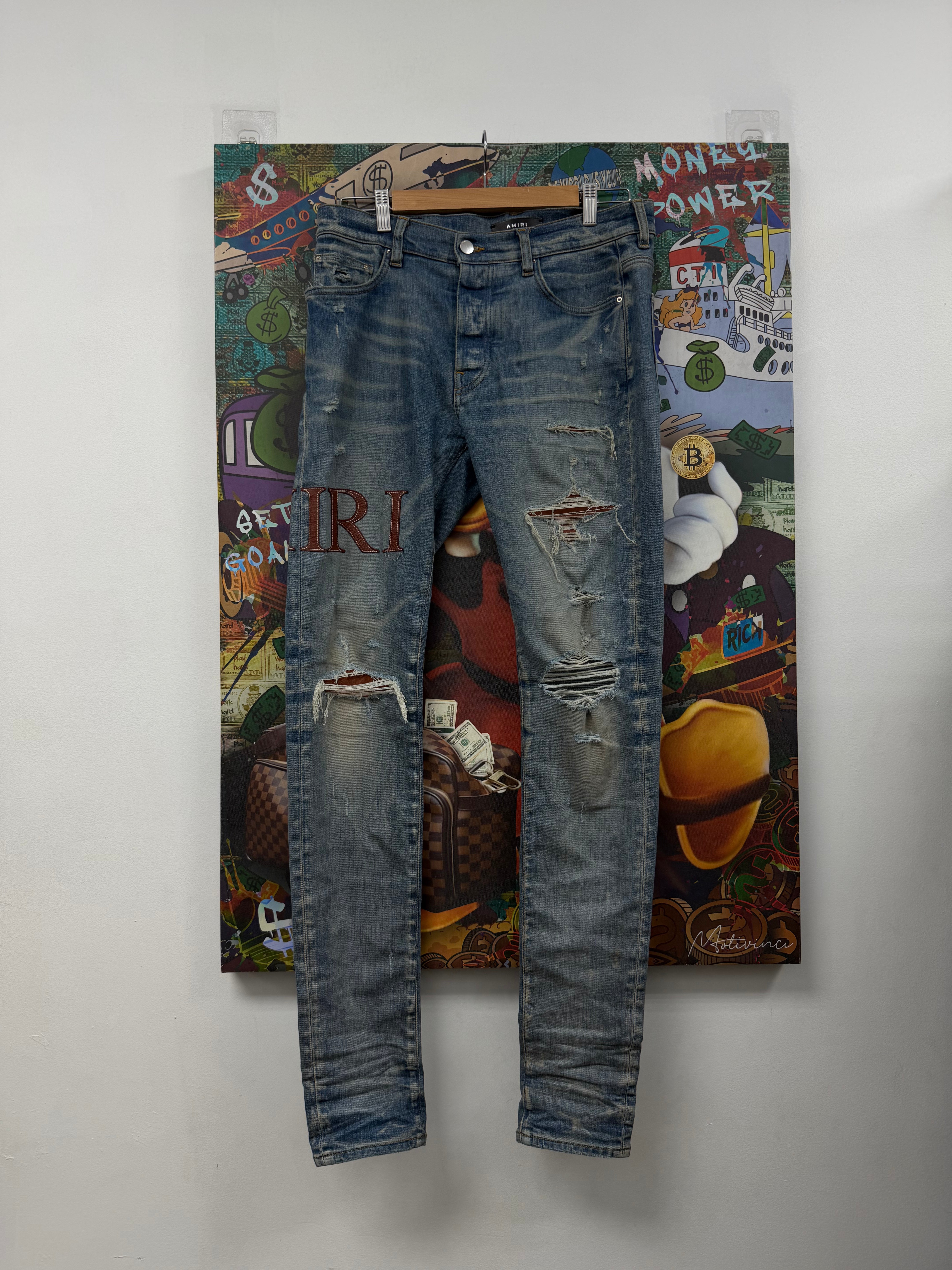 Amiri Light Wash Clay Leather Serif Side Logo Jeans