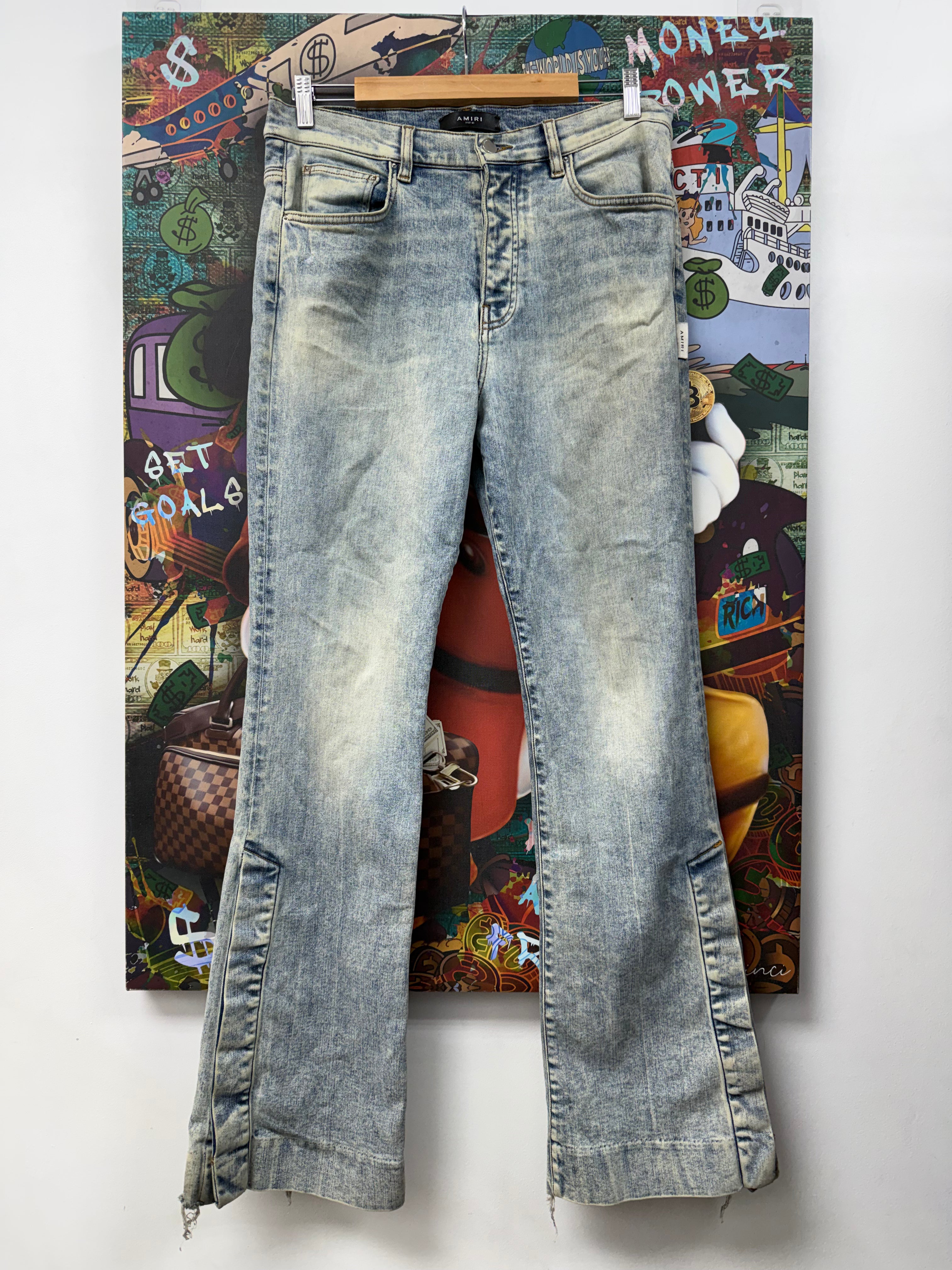 Amiri Light Wash Button Snap Flare Stacked Jeans