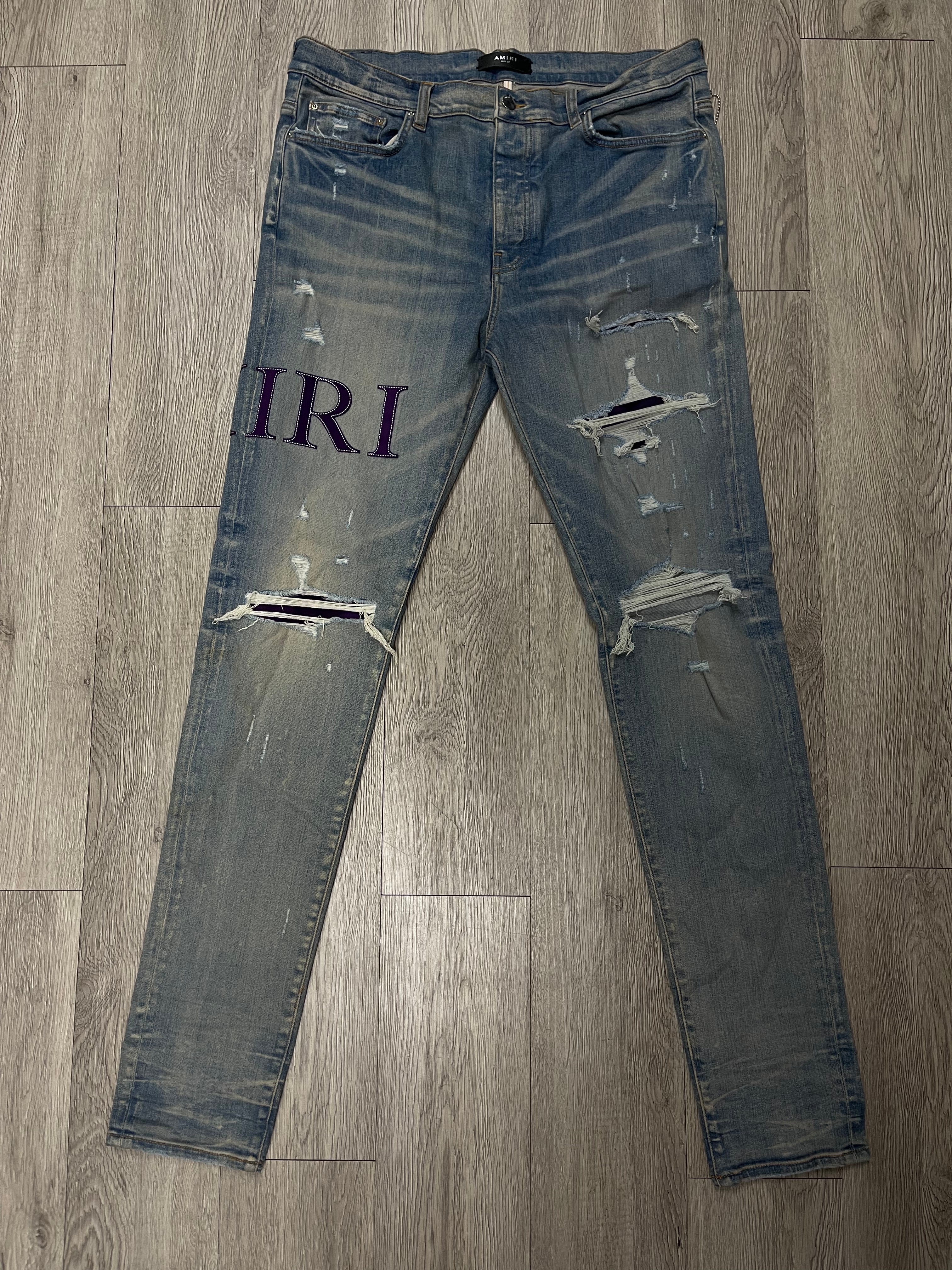 Amiri Light Wash Purple Serif Side Logo Jeans