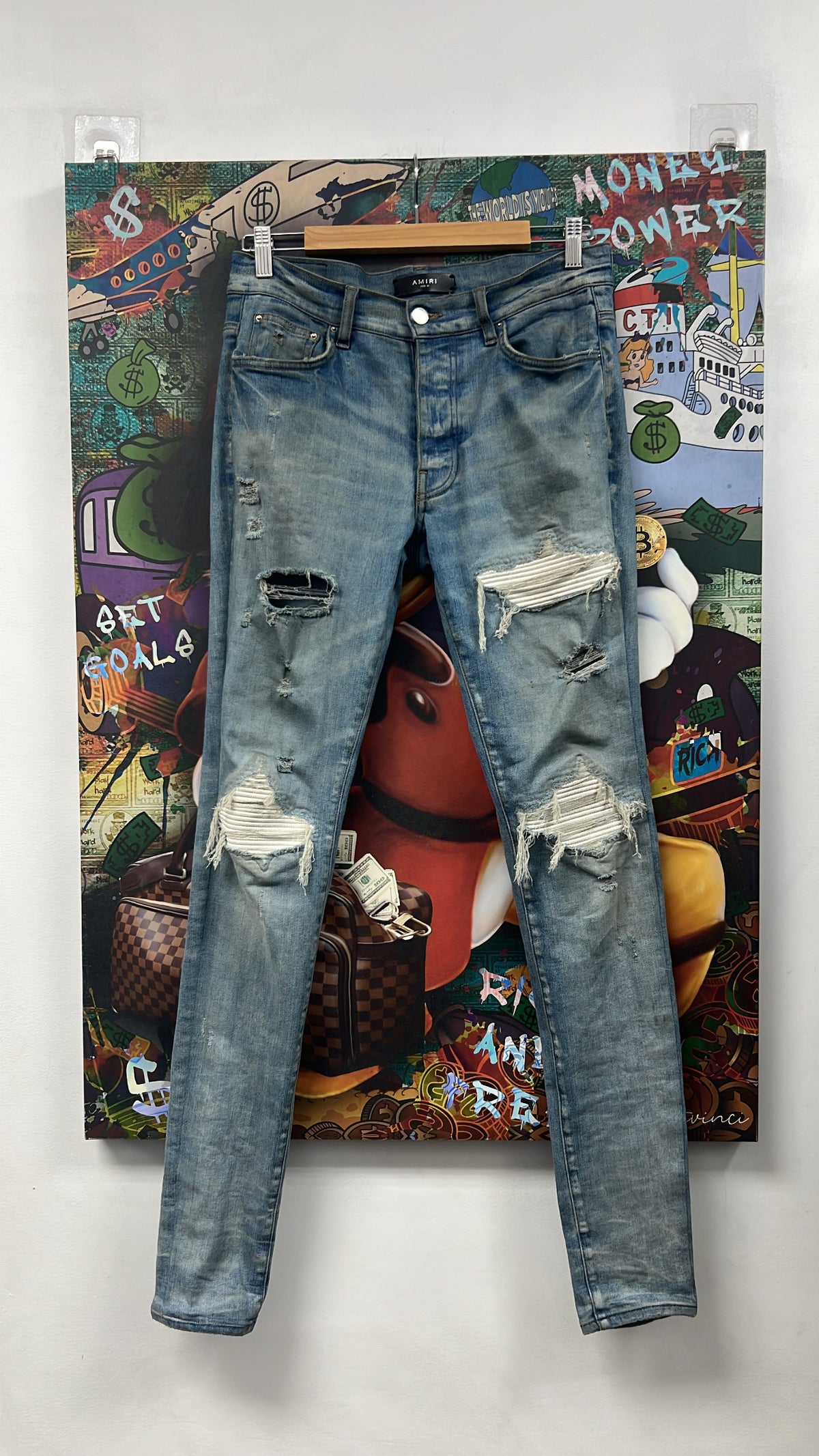 Amiri Mx1 Light Wash White Patch Jeans