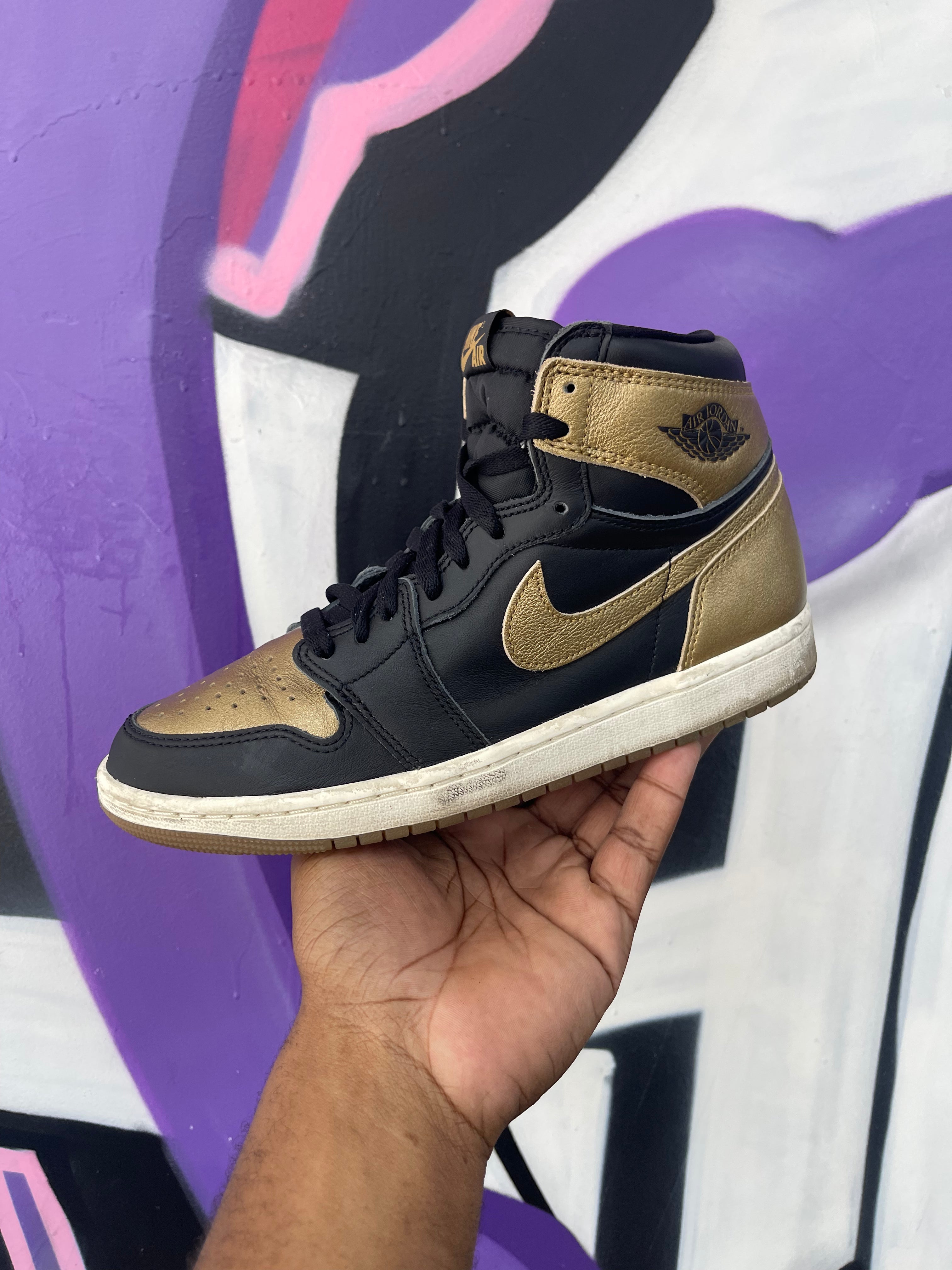 Jordan 1 Black Metallic Gold Sneakers