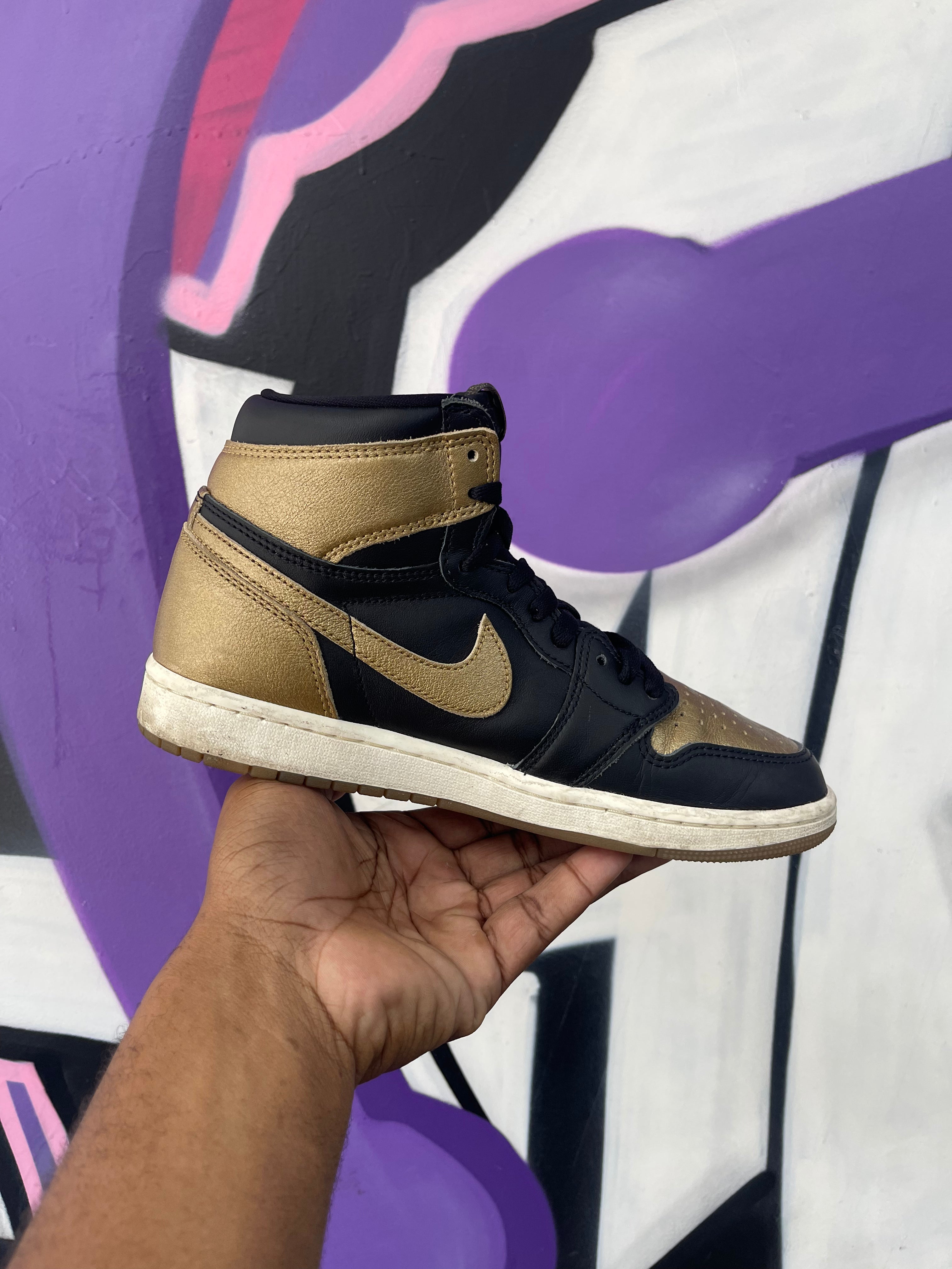 Jordan 1 Black Metallic Gold Sneakers