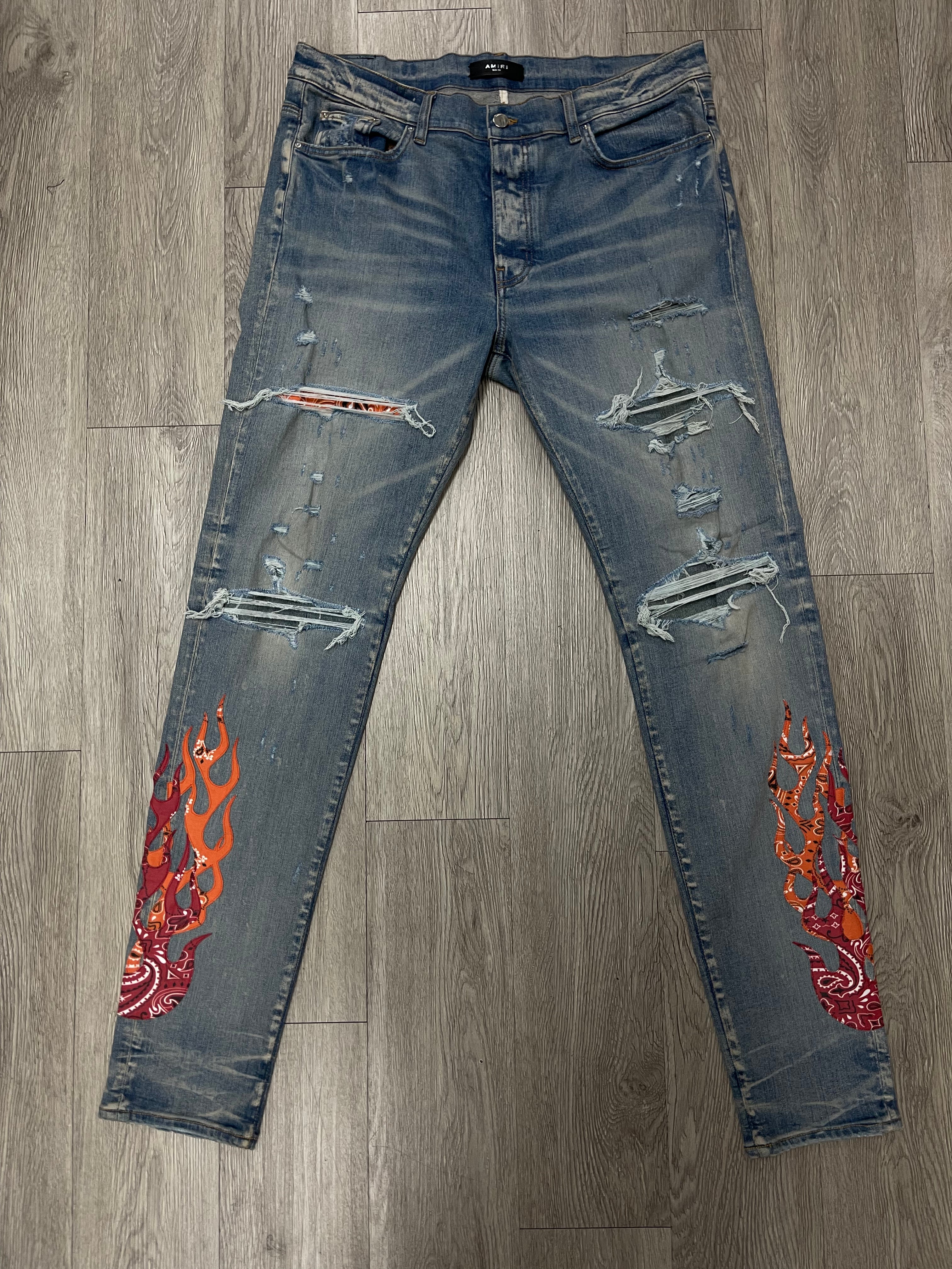 Amiri Light Wash Orange Flames Jeans