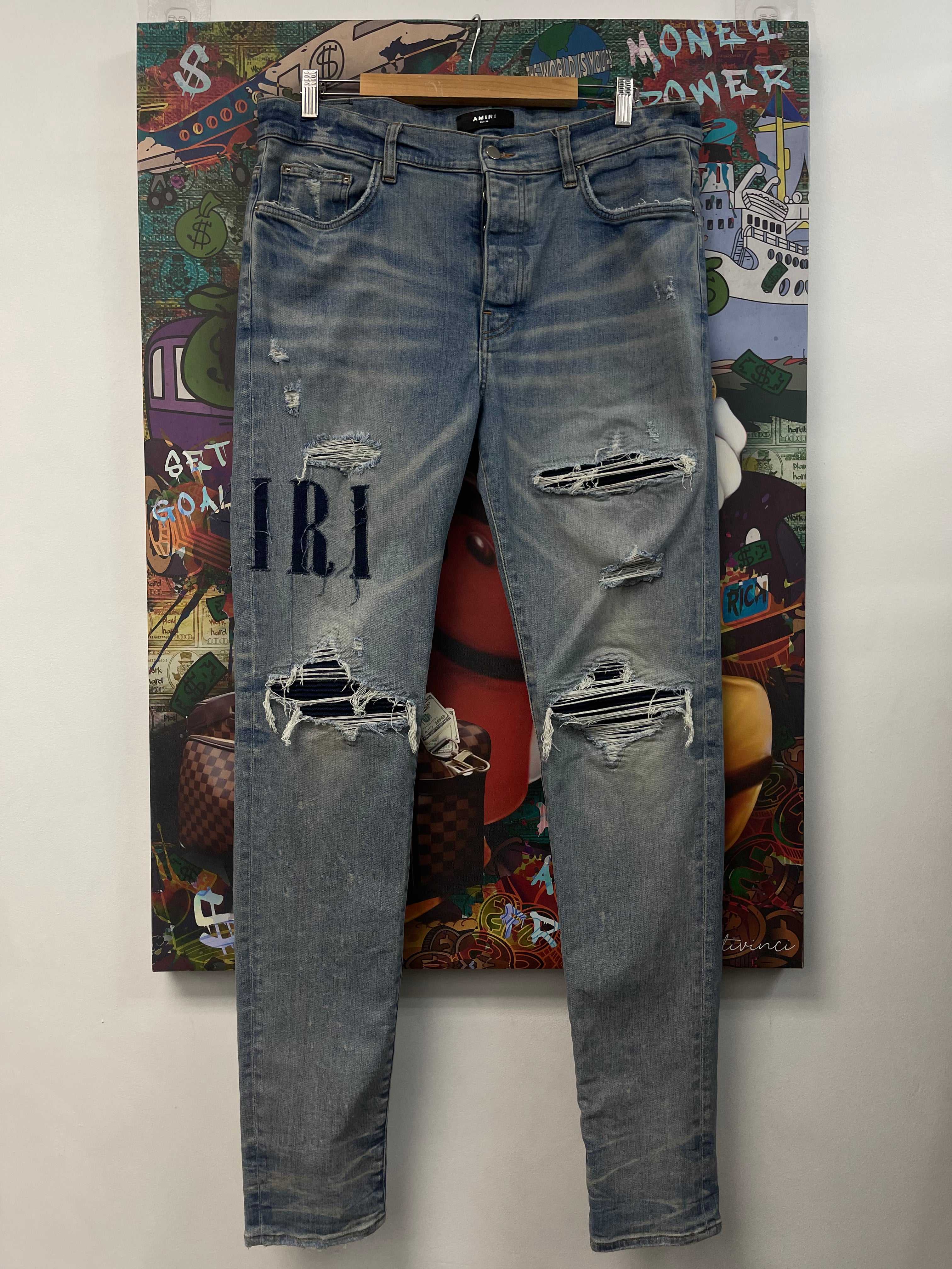 Amiri Light Wash MX1 Denim Side Logo Jeans