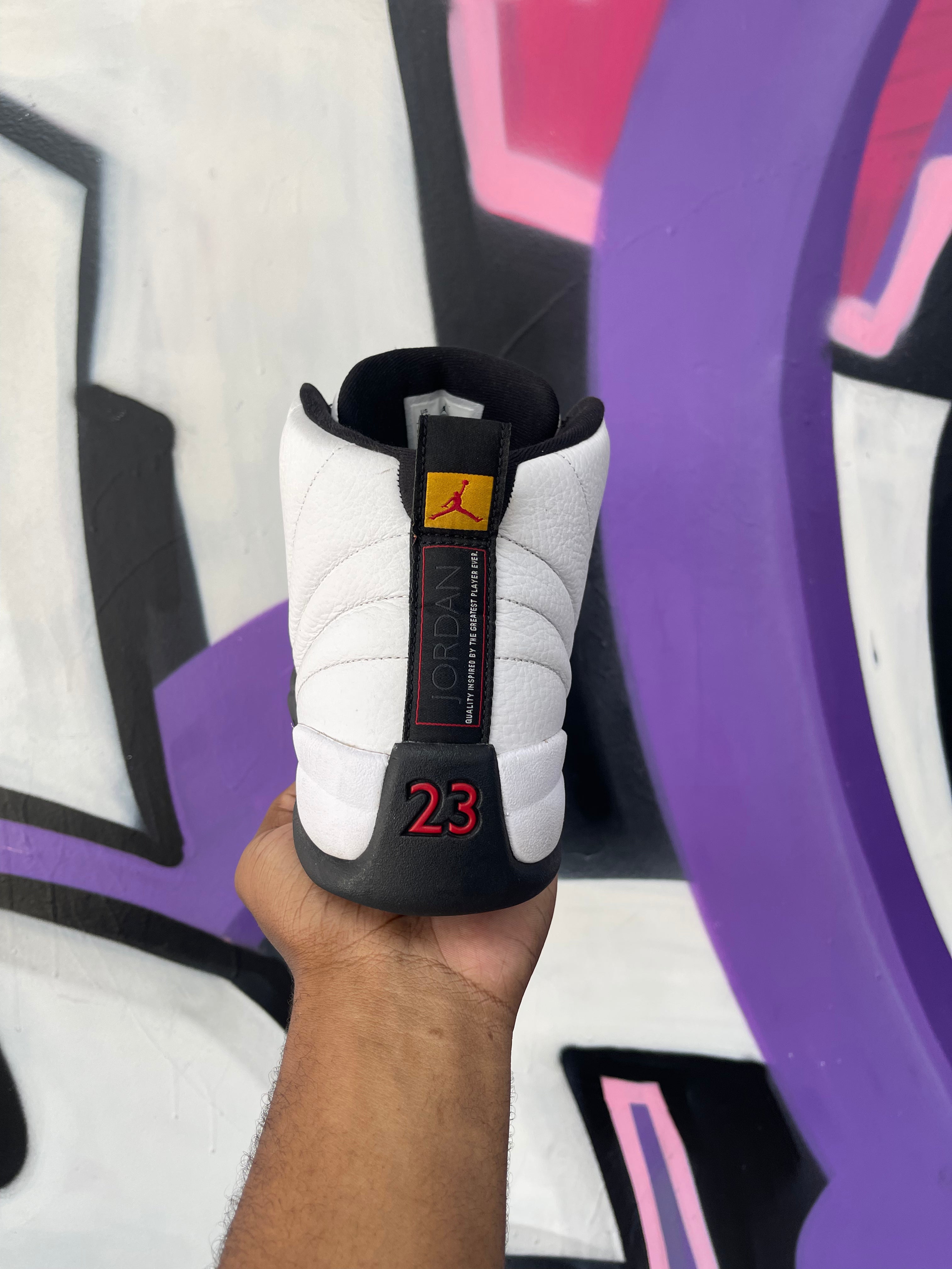 Jordan 12 Taxi Flip Sneakers
