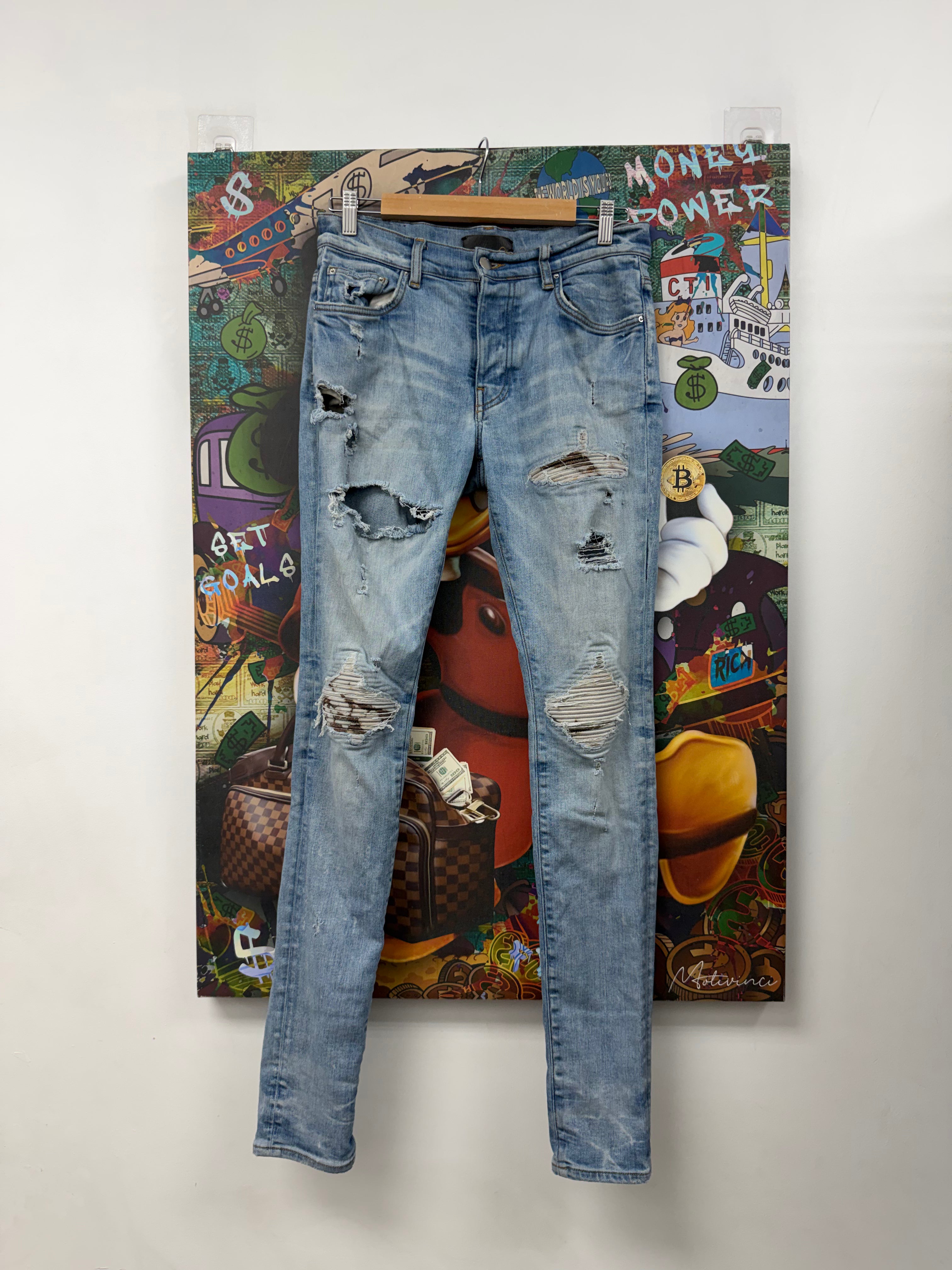 Amiri MX1 Light Wash Marble Patch Jeans