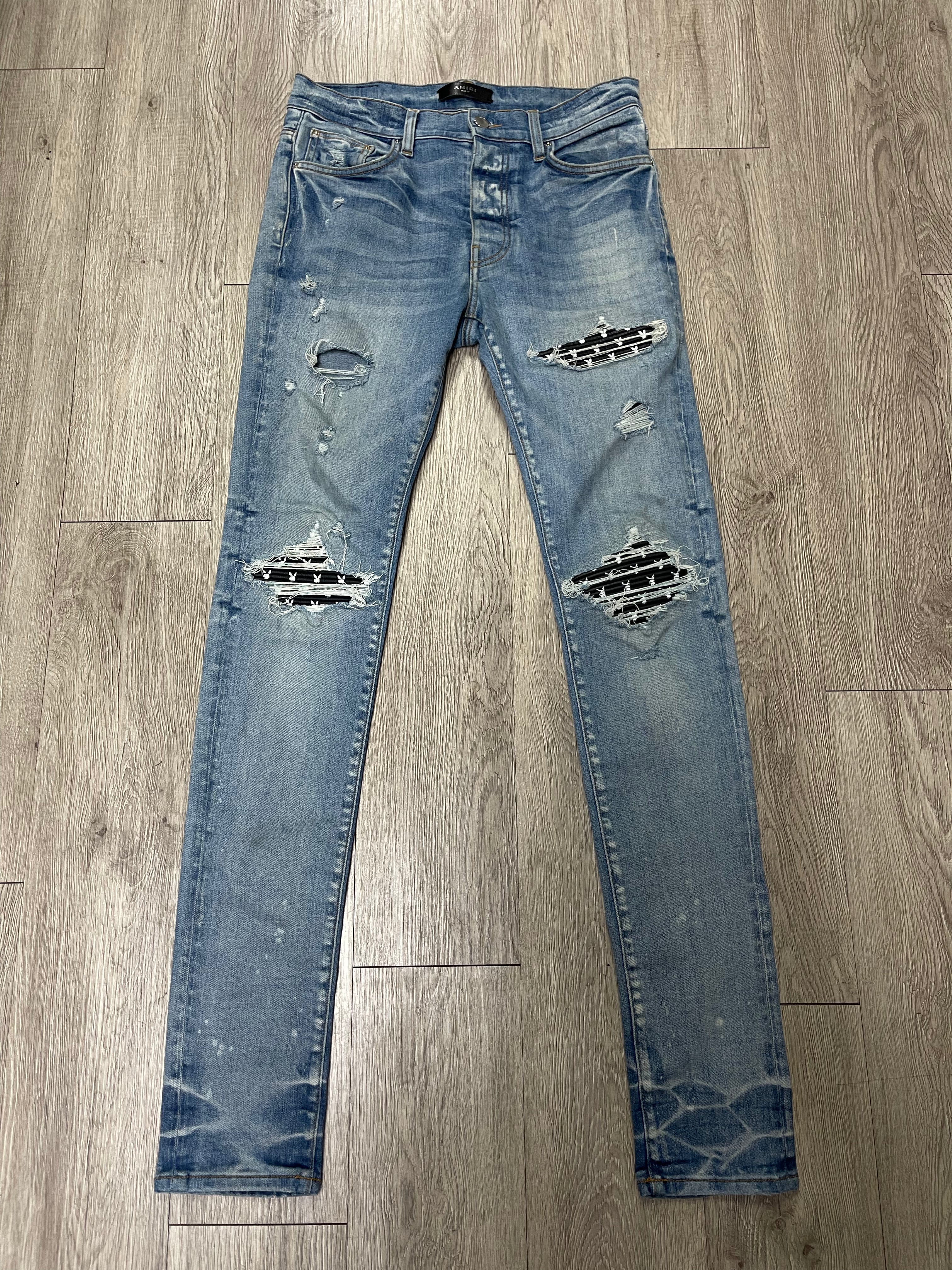 Amiri MX1 Light Wash Playboy Patch Jeans