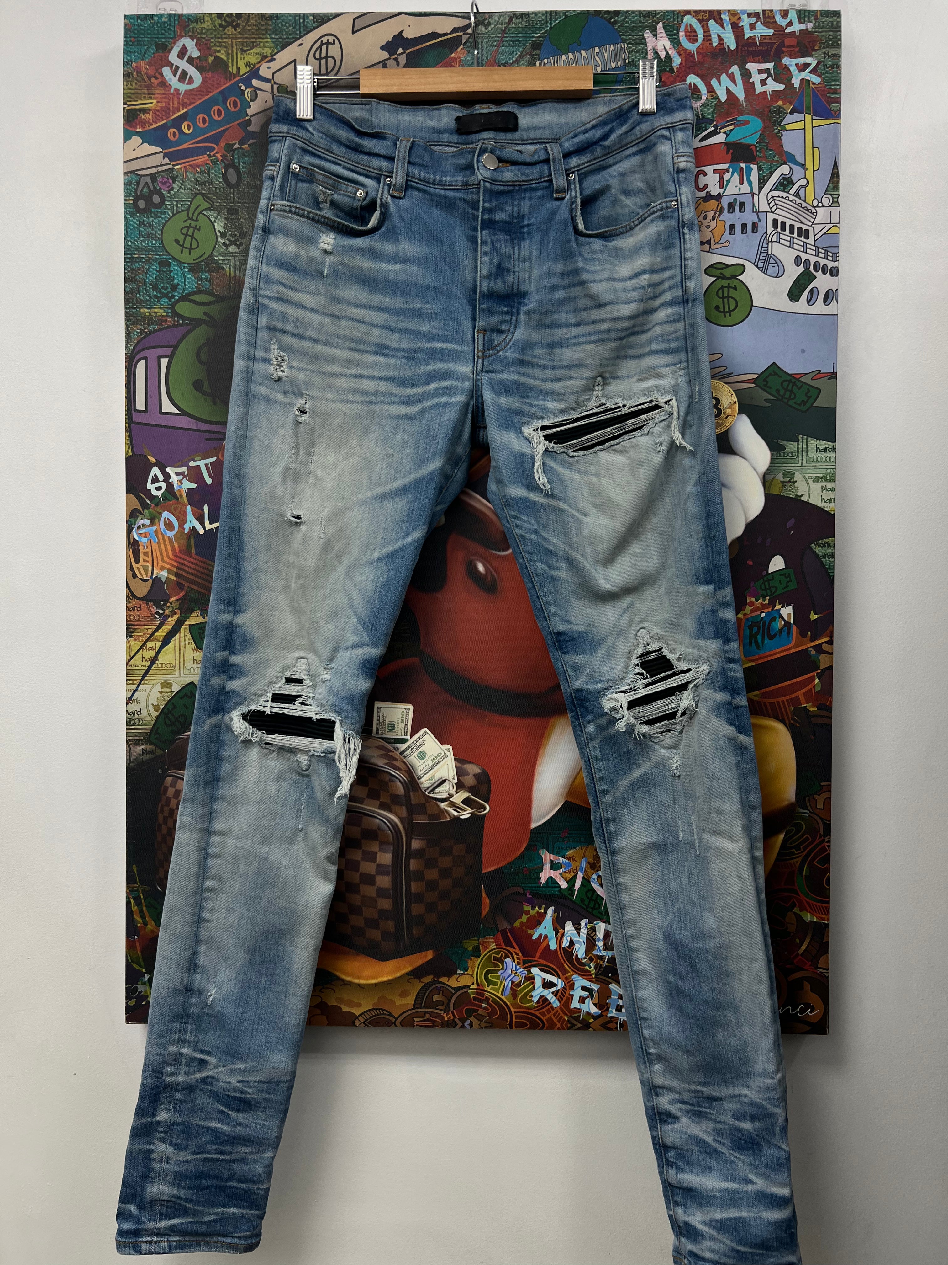 Amiri MX1 Light Indigo Black Patch Jeans