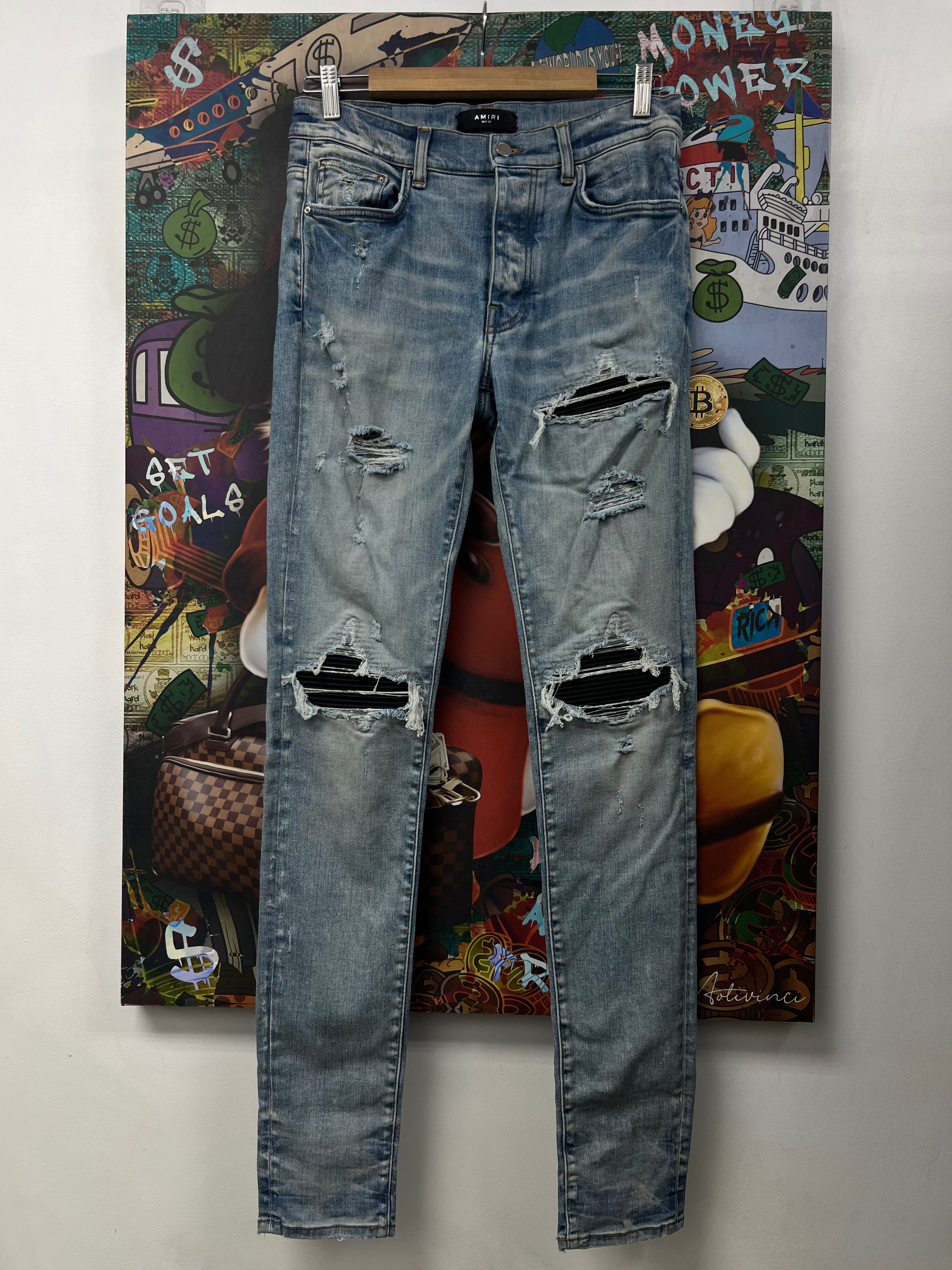 Amiri Mx1 Light Wash Black Patch Jeans