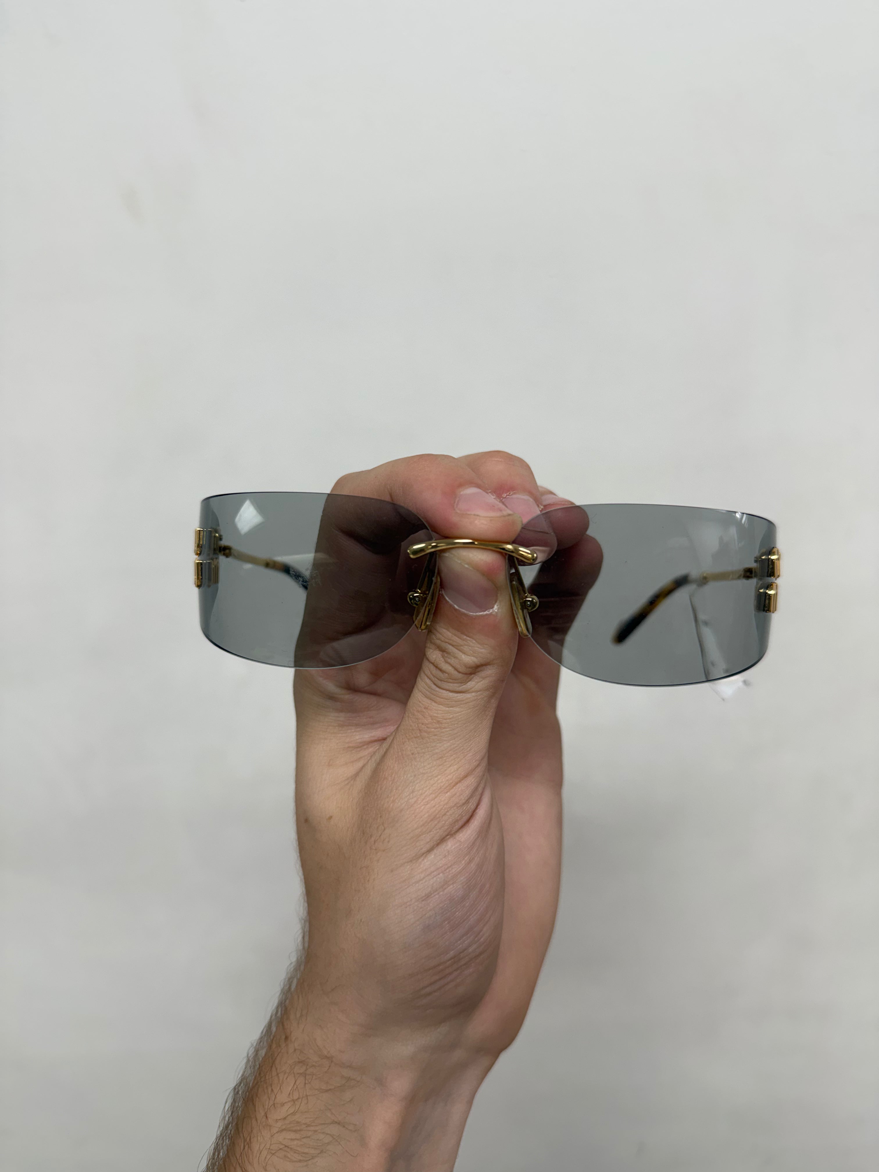 Miu Miu Gold Aube Rimless Glasses