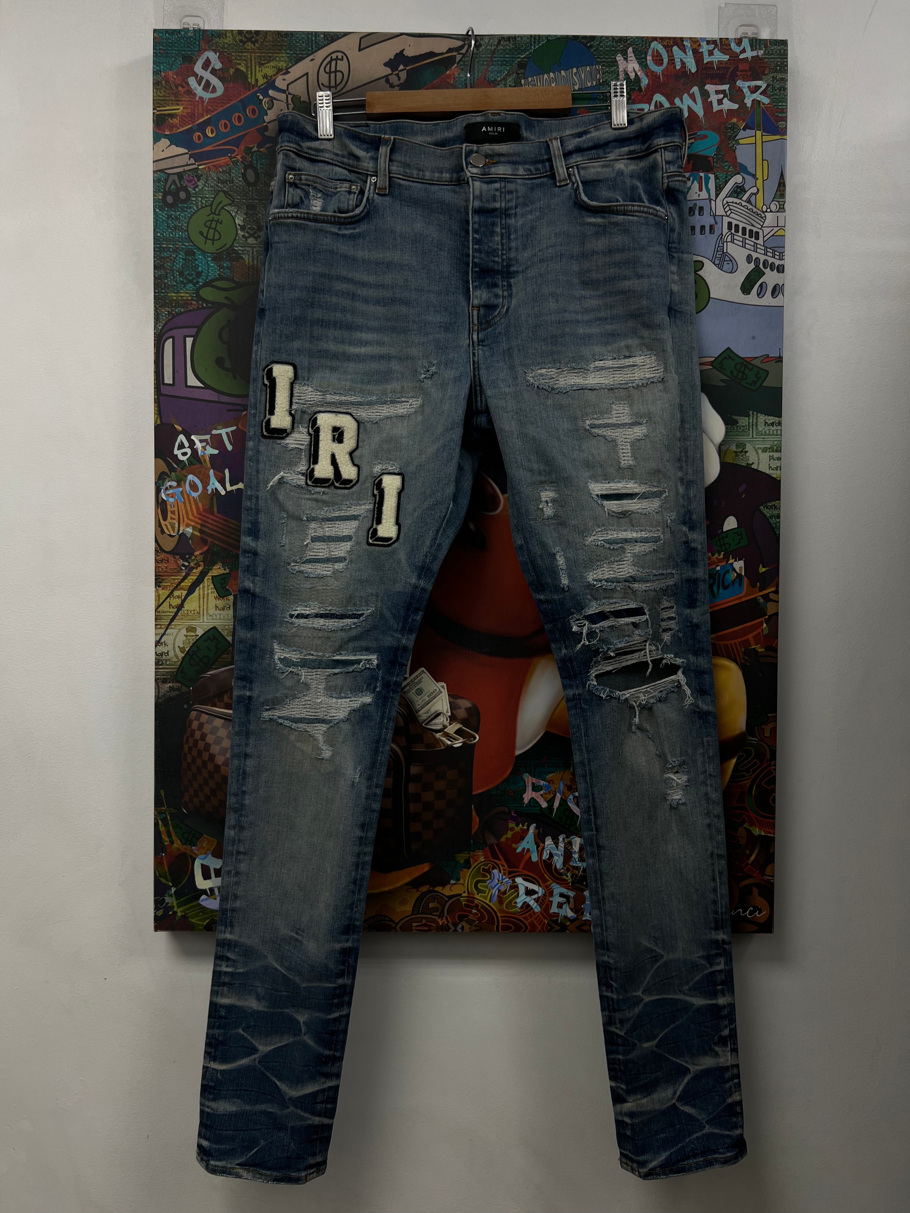 Amiri Light Wash Varsity Patch Jeans