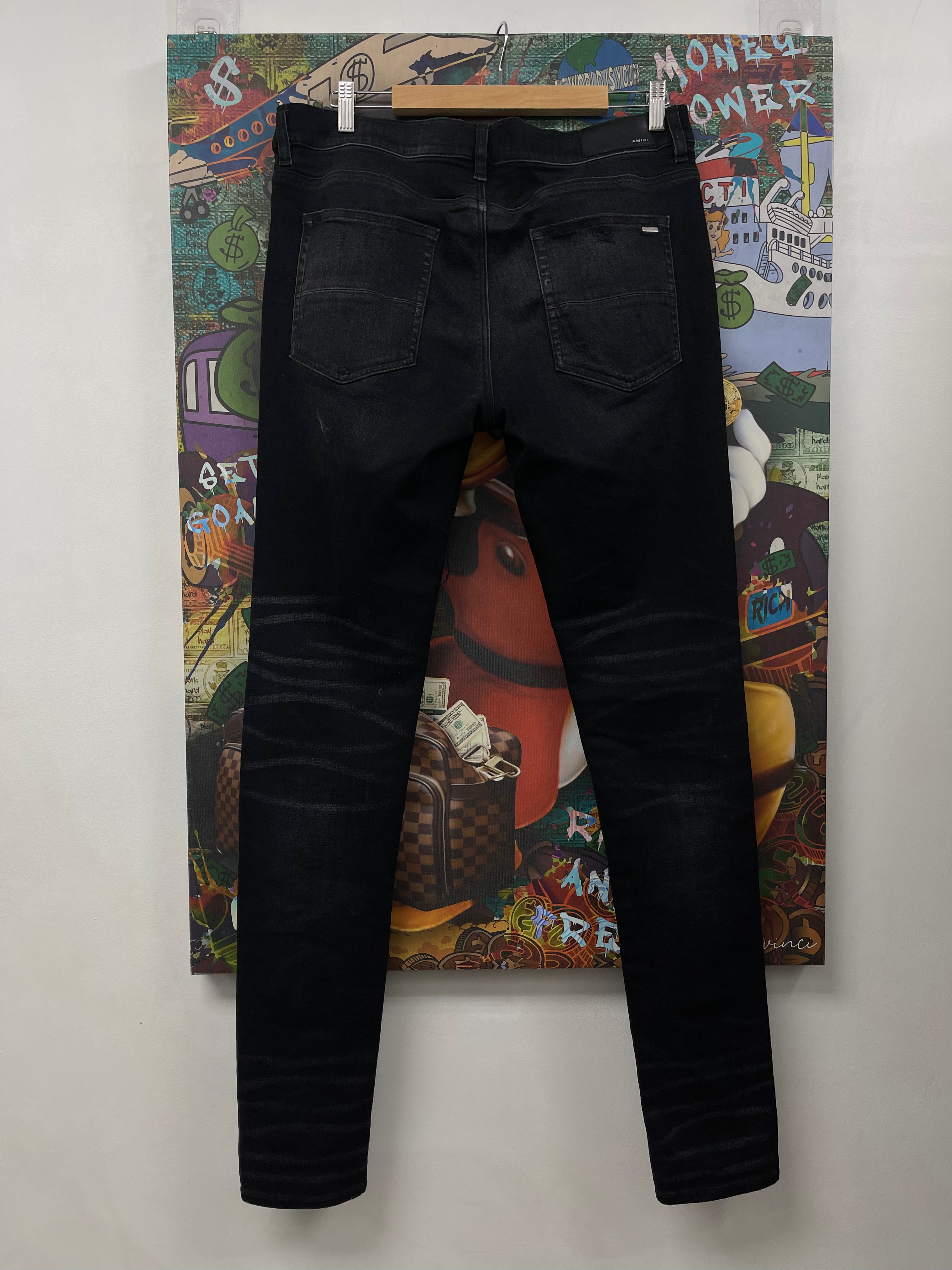 Amiri MX1 Black Wash Blue Crackle Patch Jeans