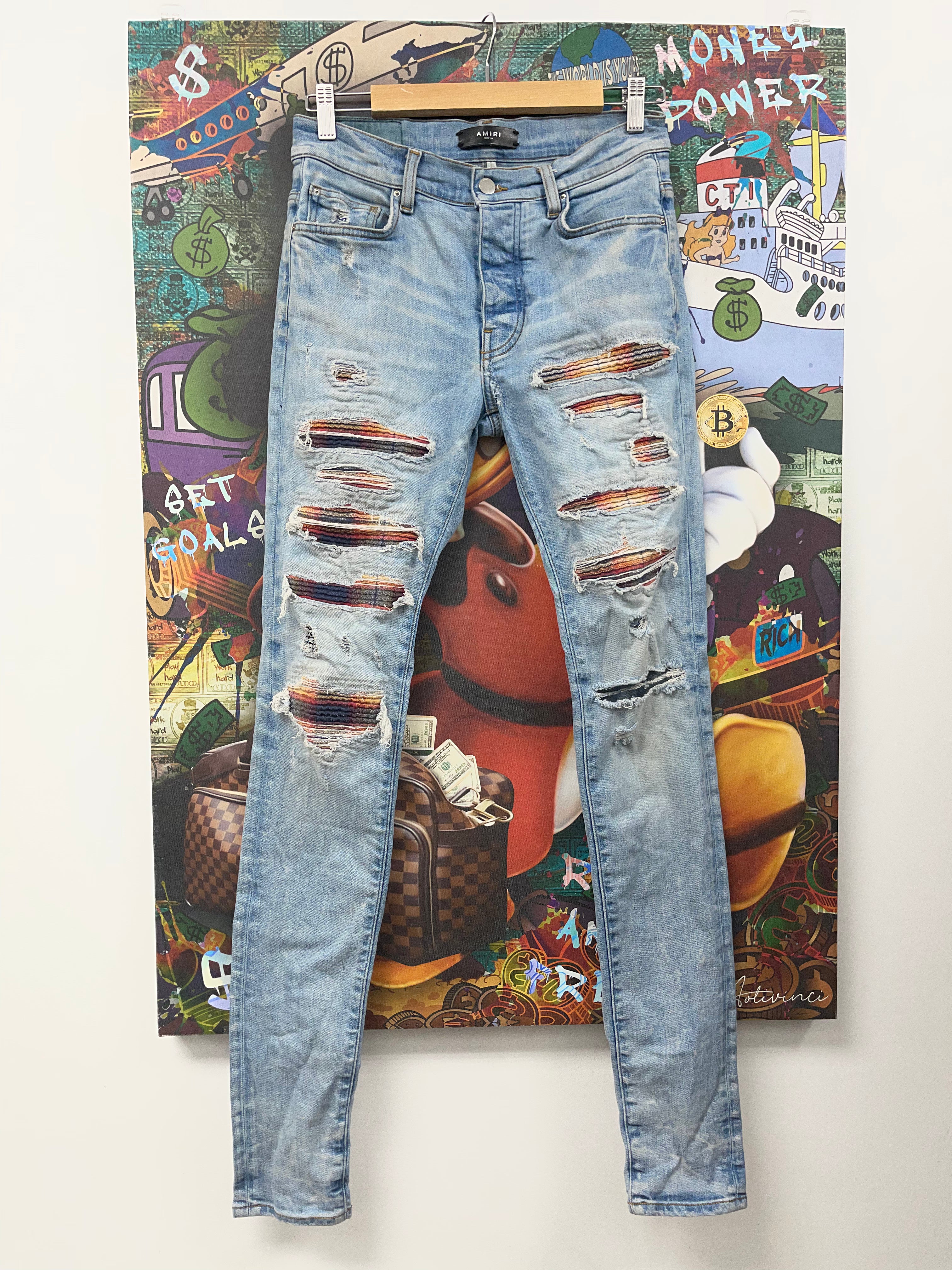 Amiri Light Wash Sunset Thrasher Patch (Tear By Crotch) Jeans
