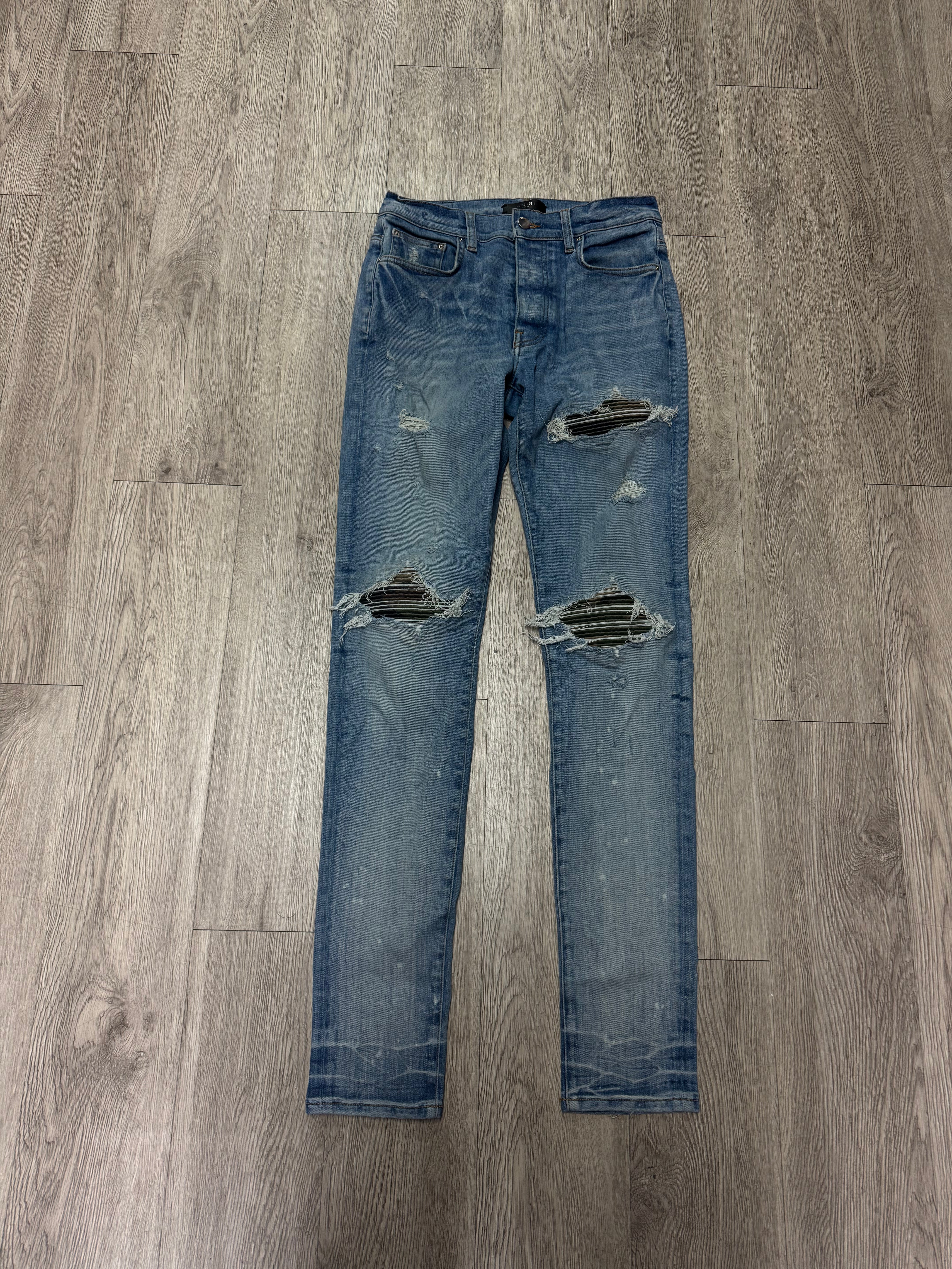 Amiri MX1 Light Wash Camo Patch Jeans