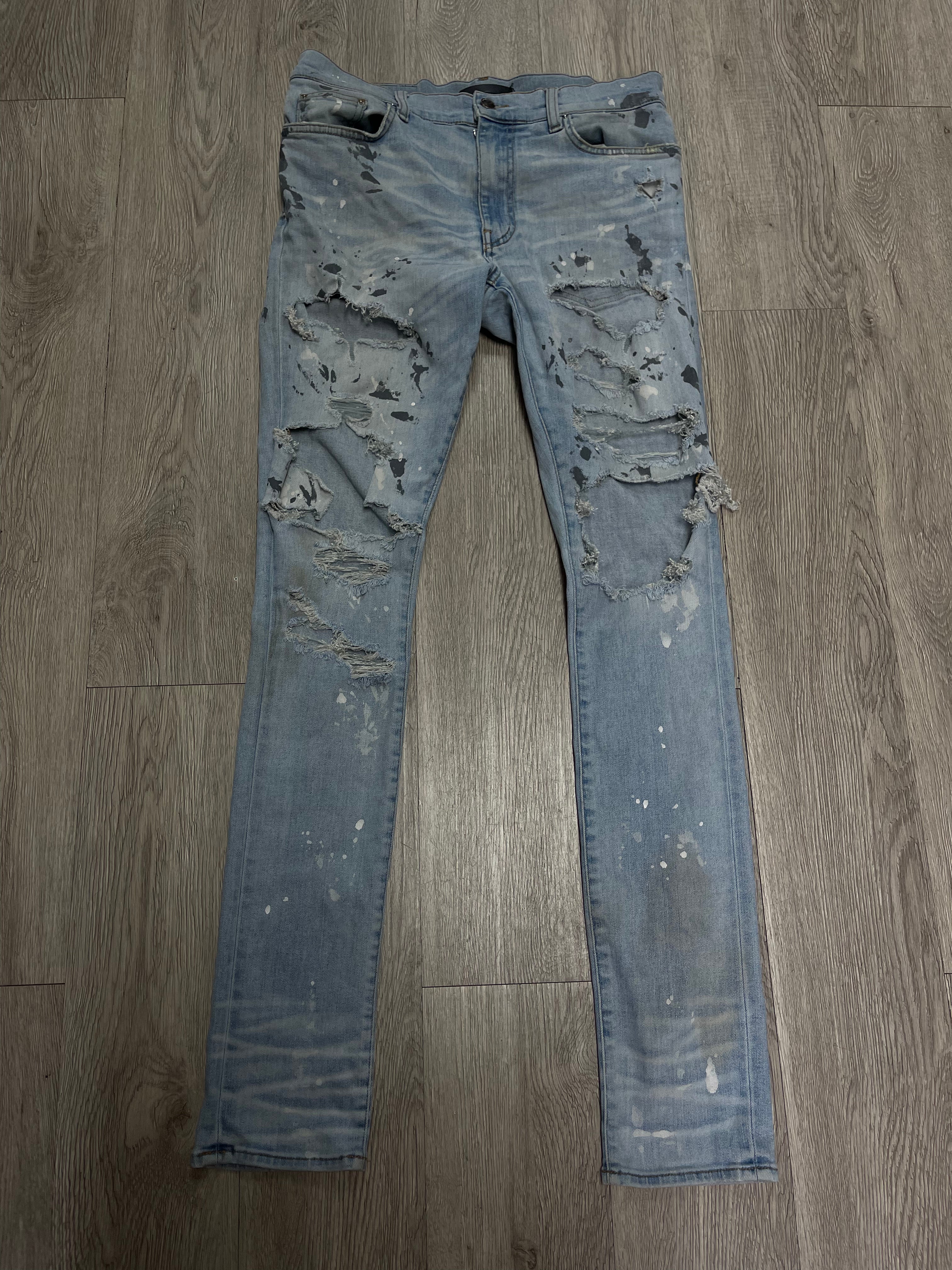 Amiri Light Wash Splatter Thrasher Jeans