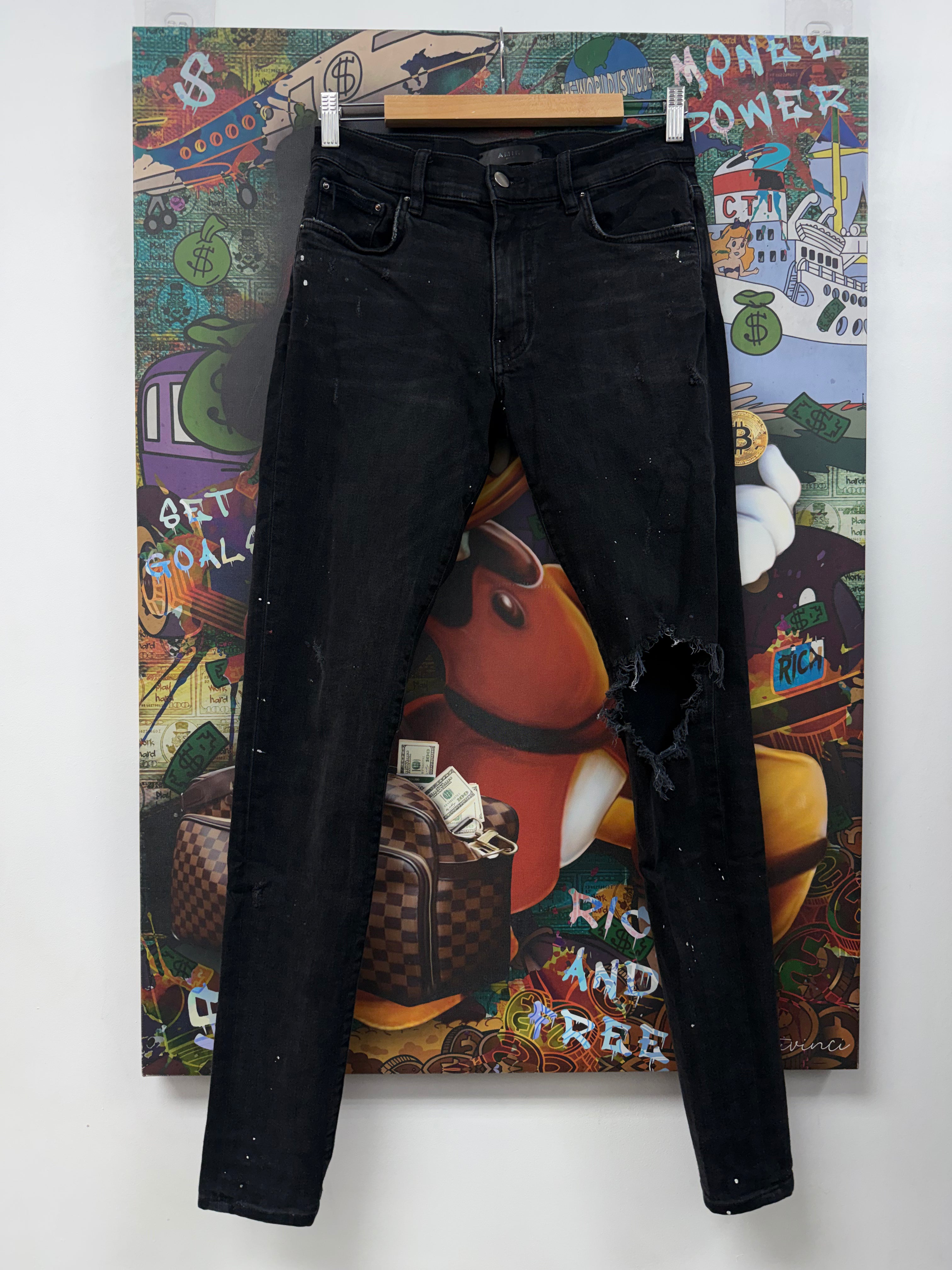 Amiri Black Wash Knee Ripped Jeans