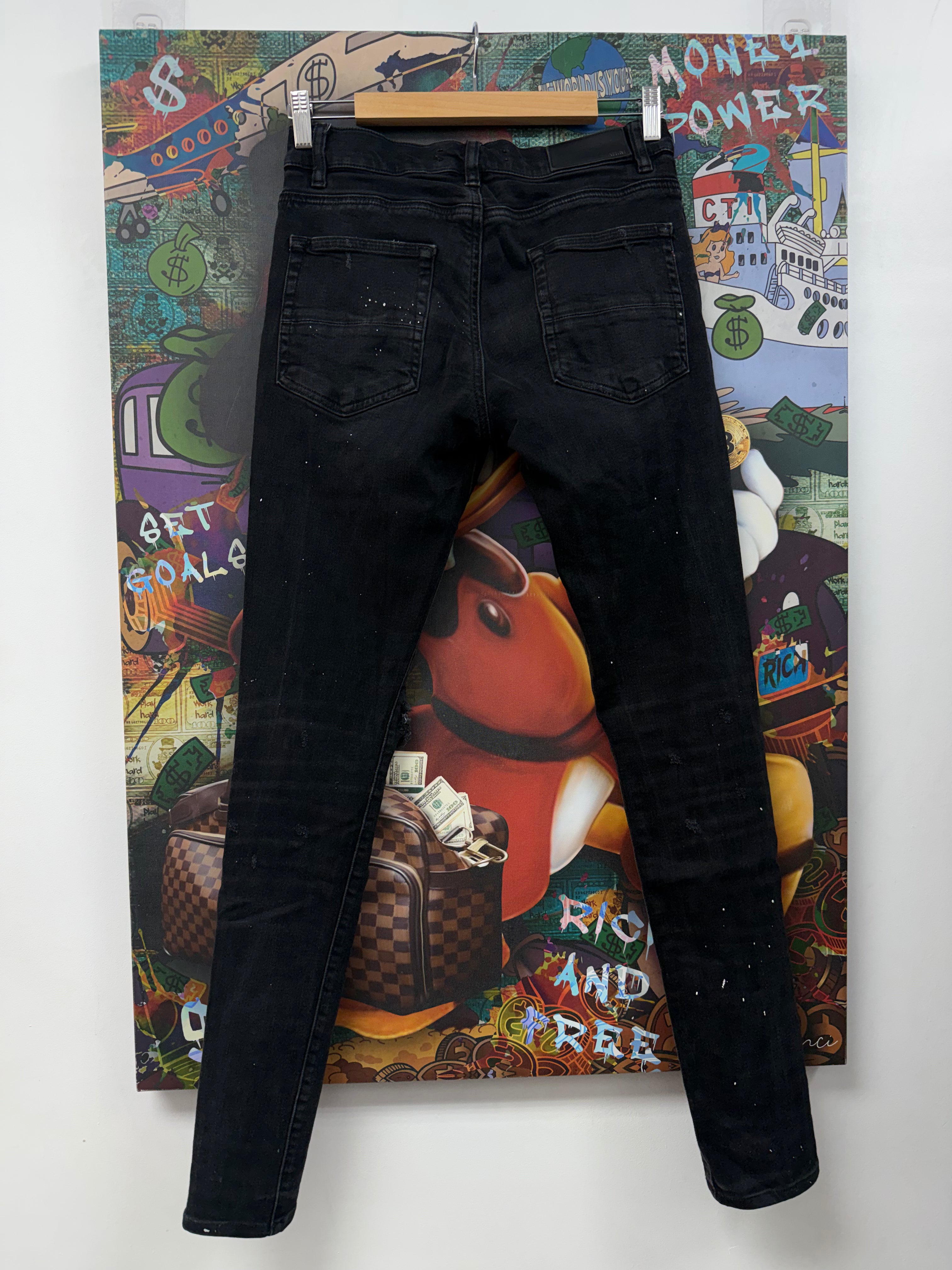 Amiri Black Wash Knee Ripped Jeans