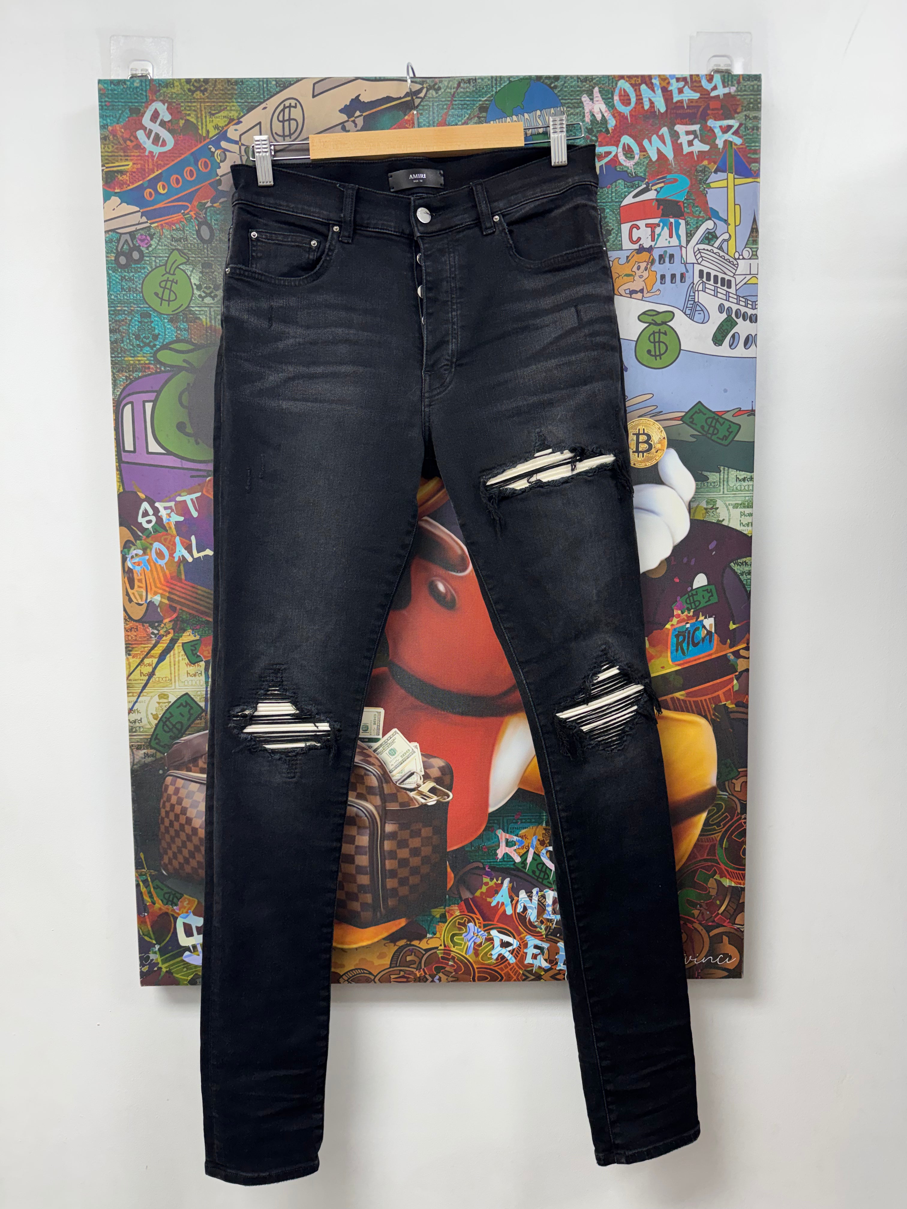 Amiri MX1 Black Wash White Patch Jeans