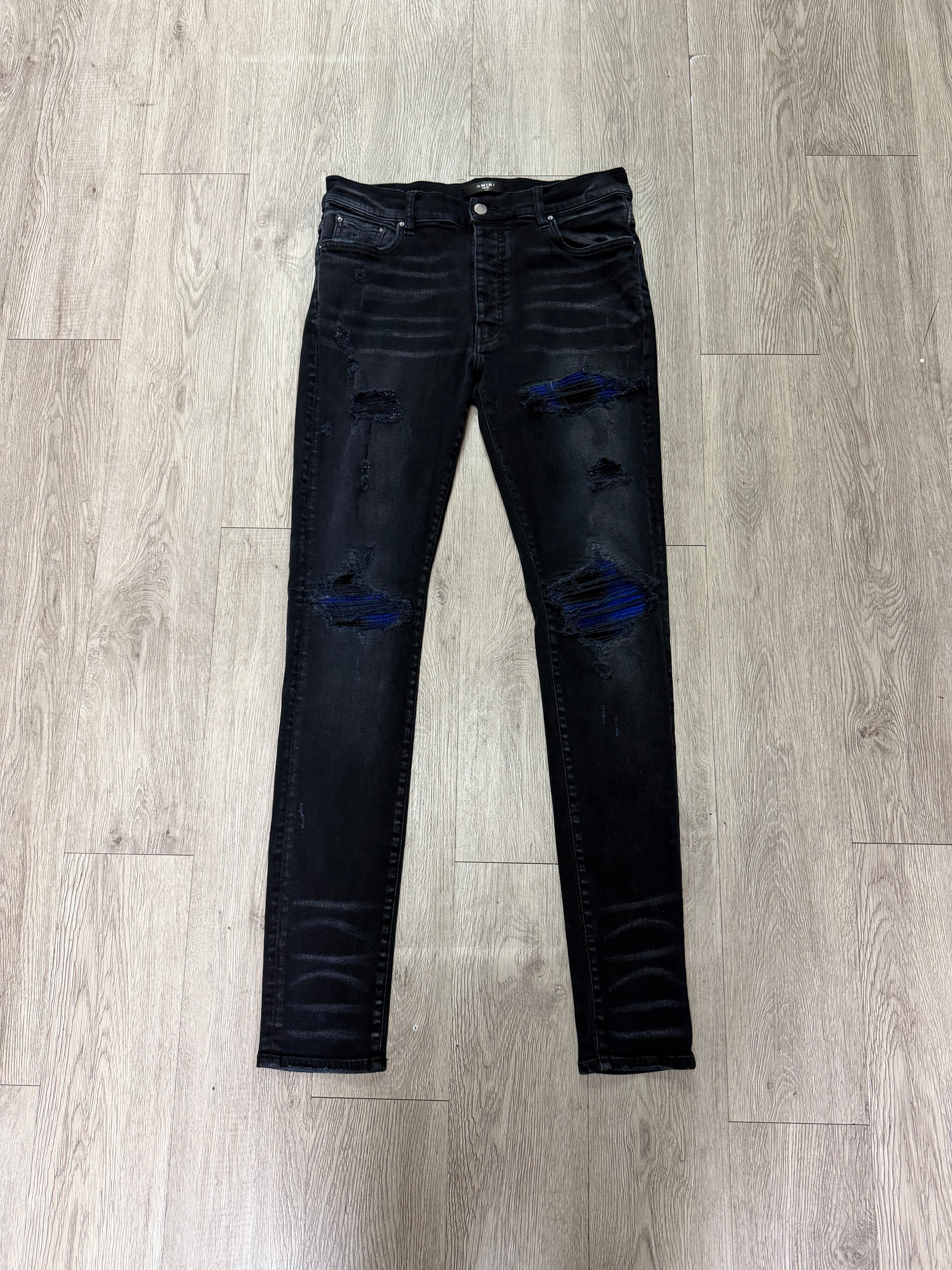Amiri MX1 Black Wash Blue Black Plaid Patch Jeans