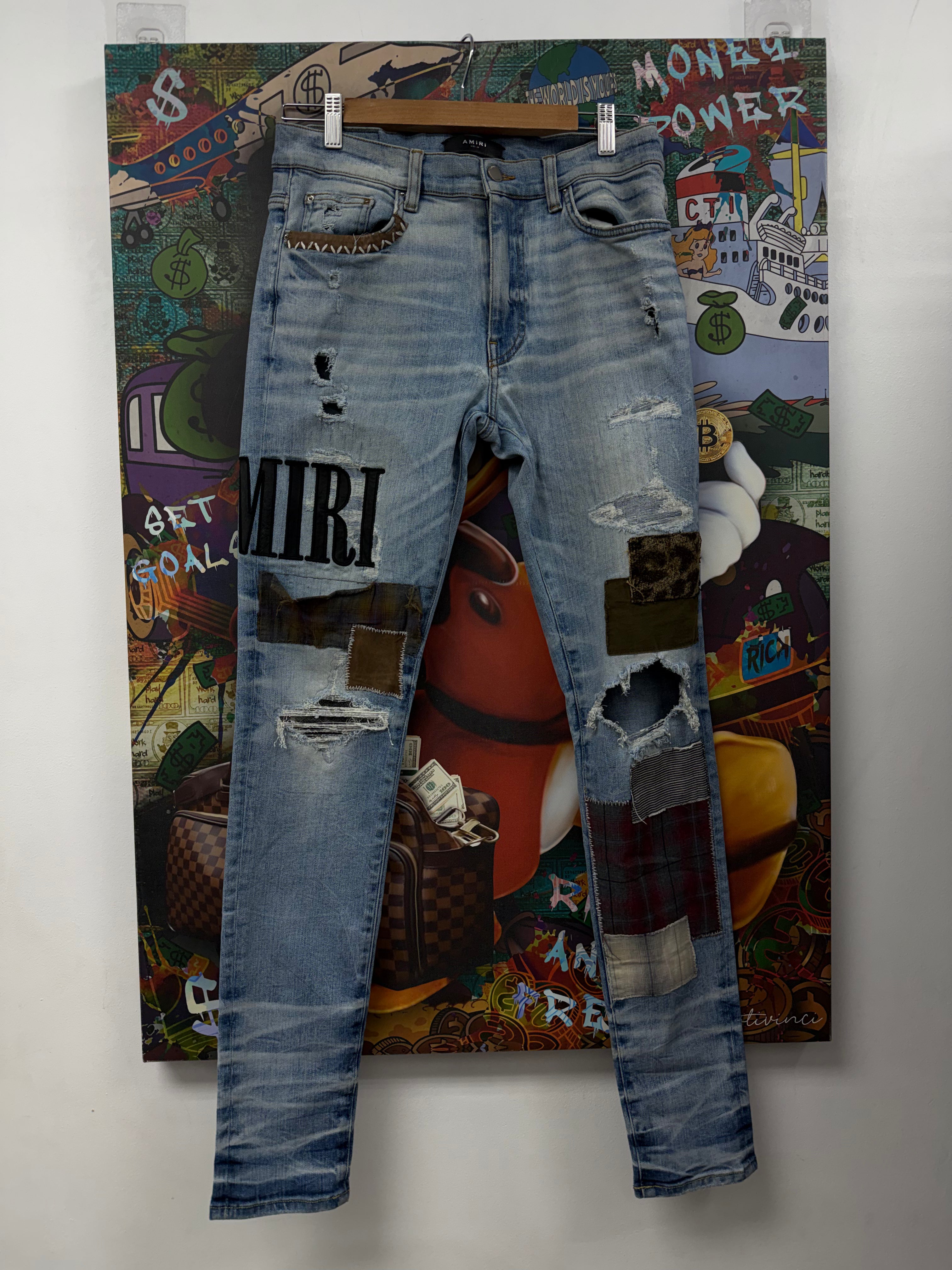Amiri Light Wash Patchwork Jeans