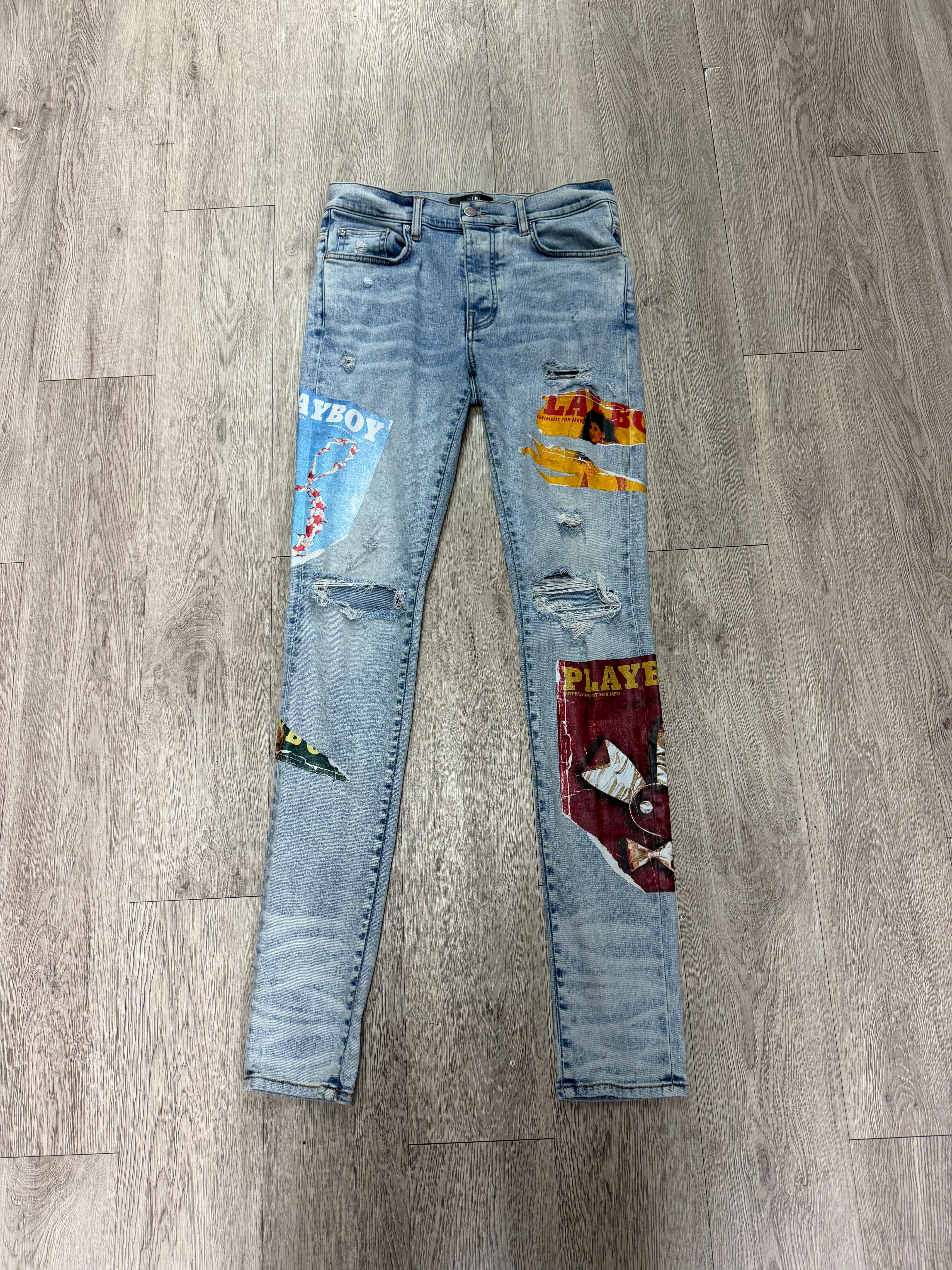 Amiri Light Wash Playboy Magazine Jeans