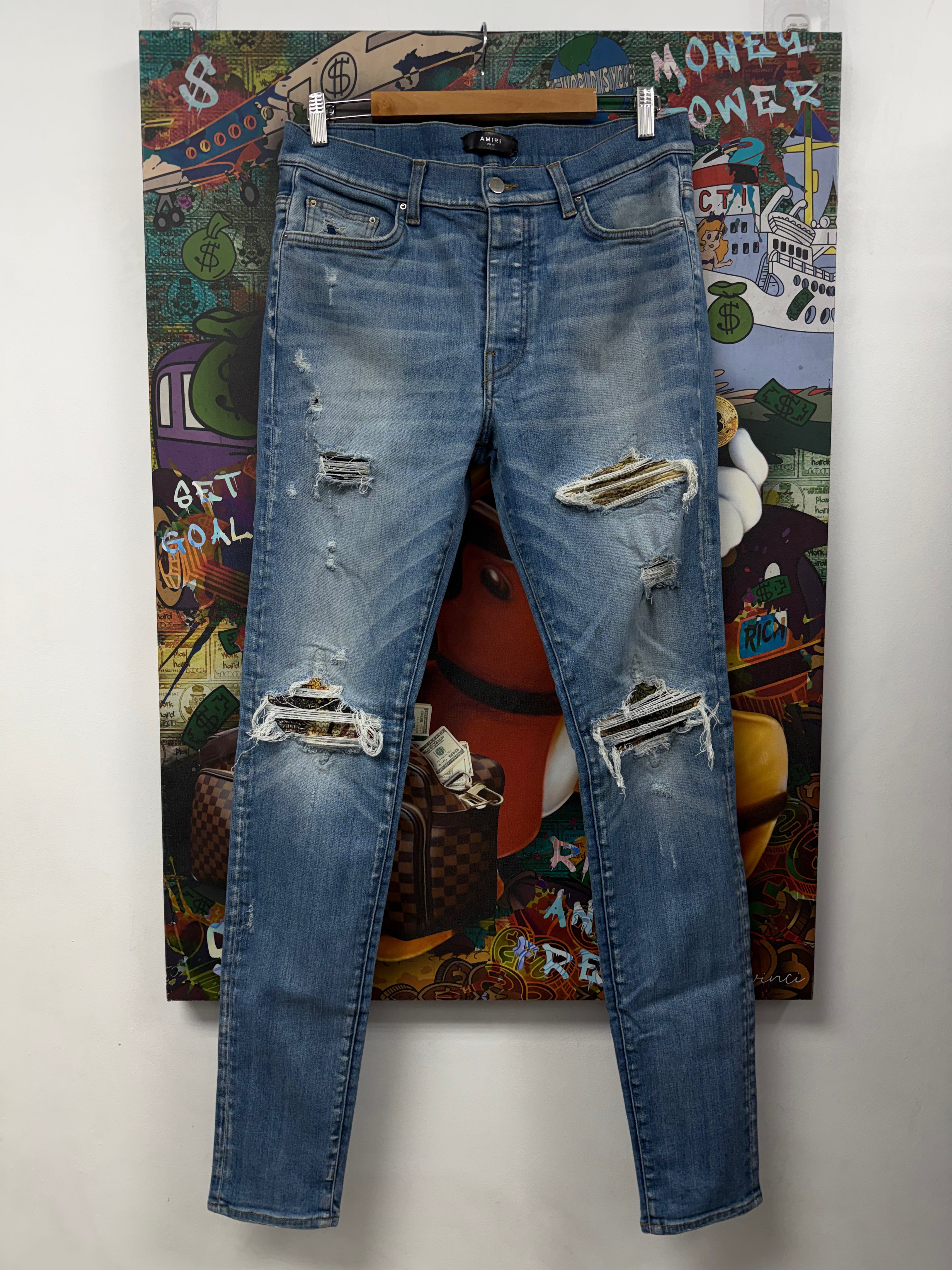 Amiri MX1 Light Wash Aloha Patch Jeans