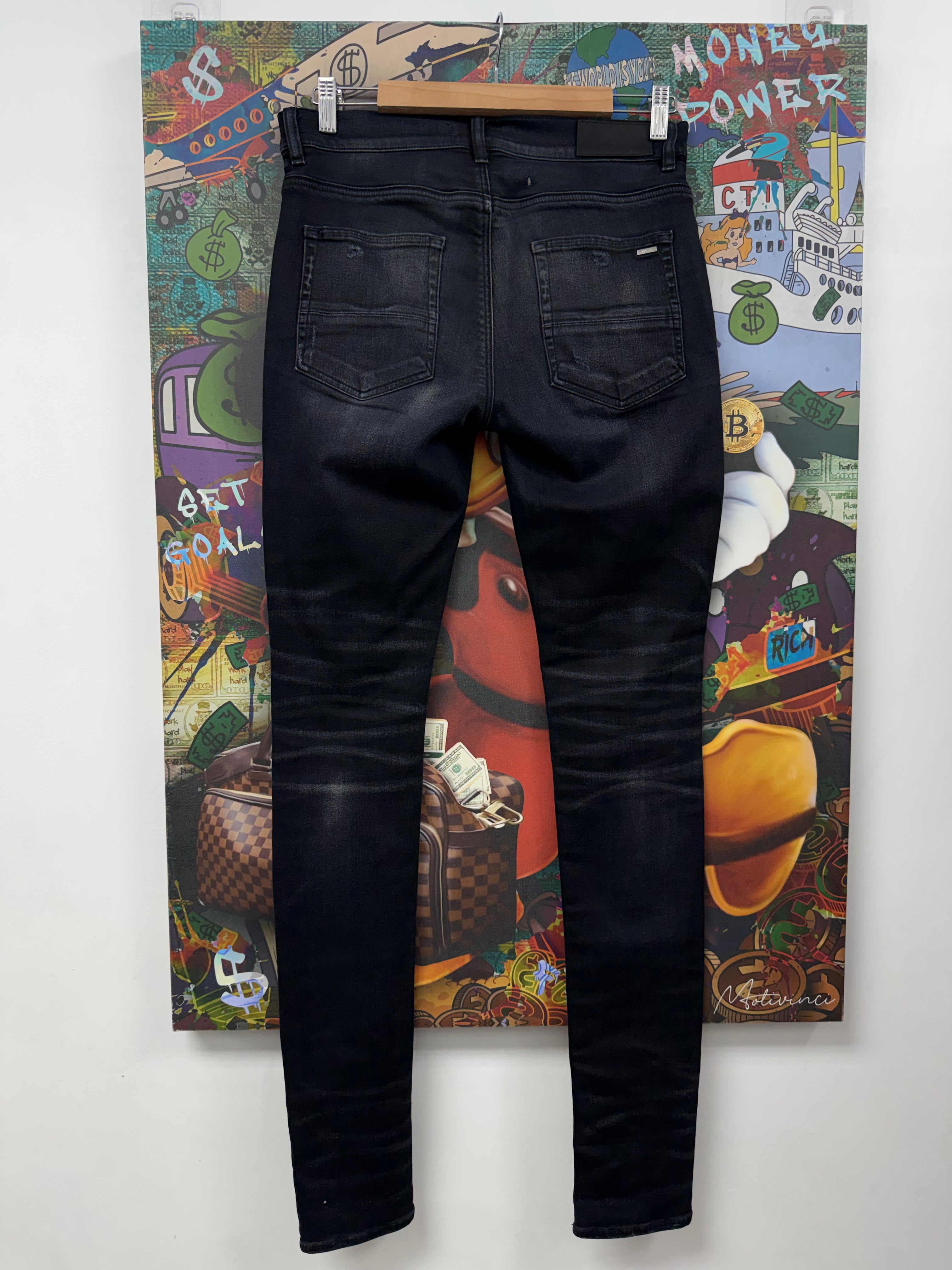 Amiri Black Wash Cheetah Thrasher Patch Jeans