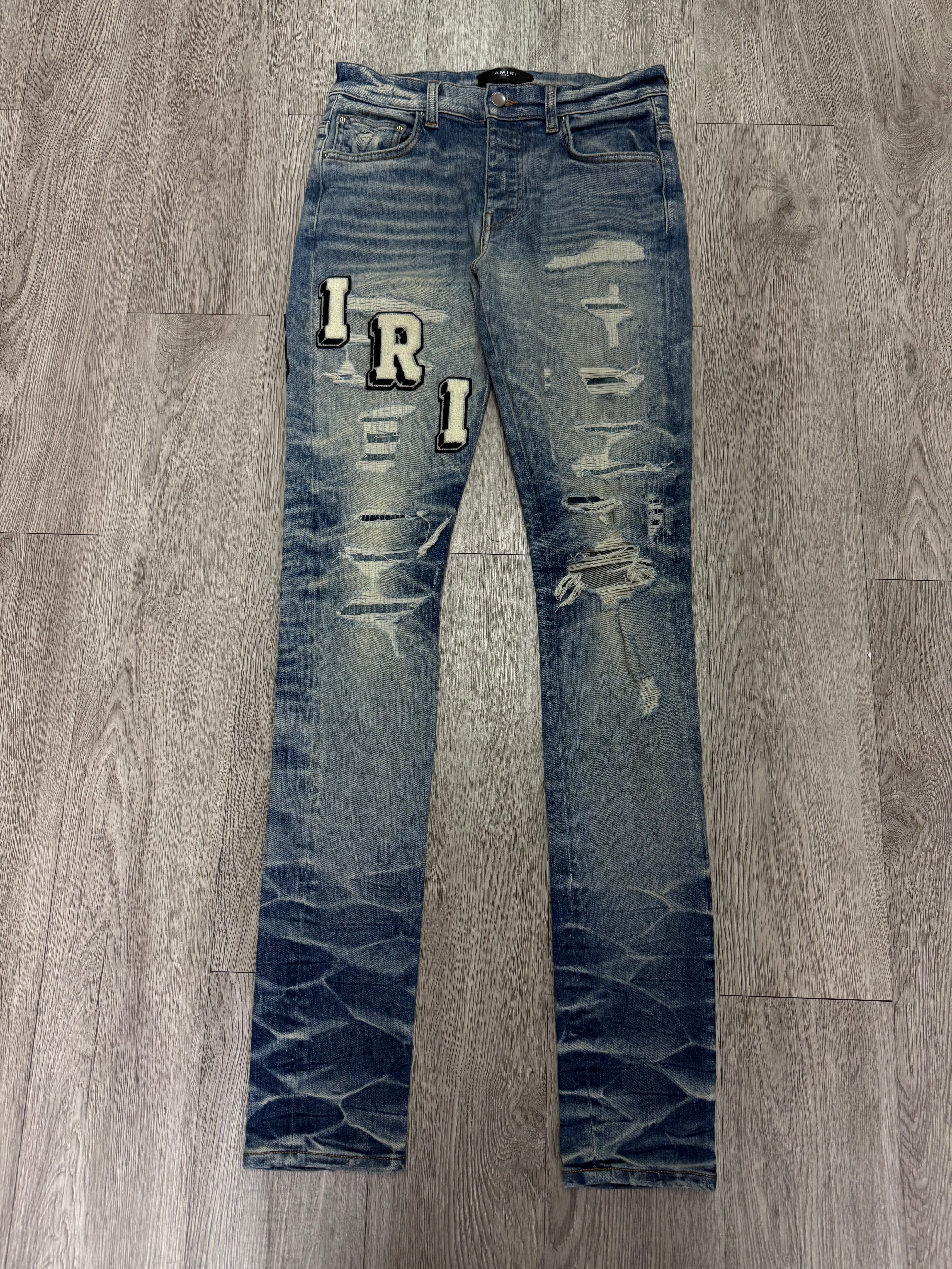 Amiri Honeycomb Wash Distressed Varsity Logo Jeans