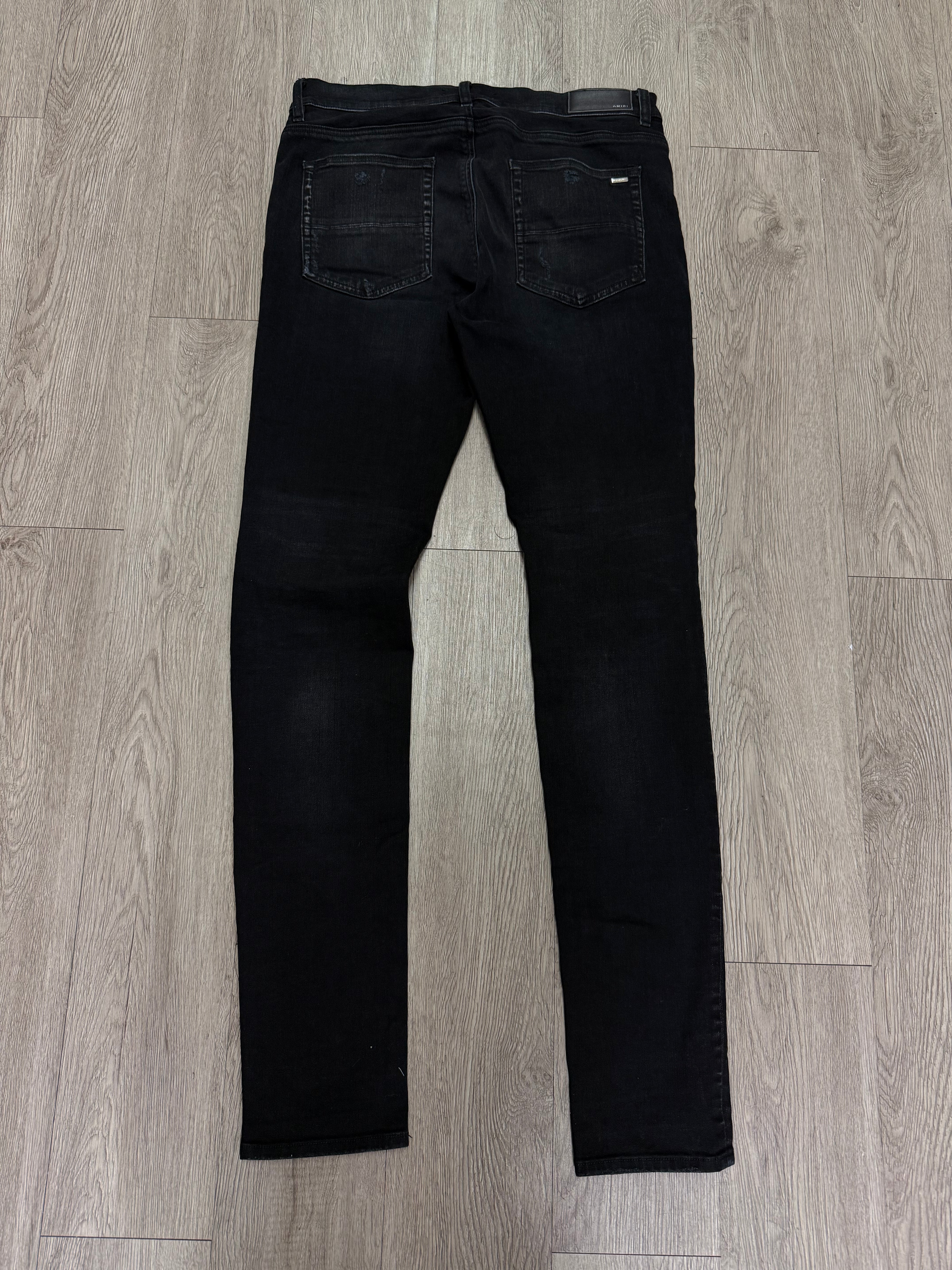 Amiri Black Wash Bandana Thrasher Patch Jeans
