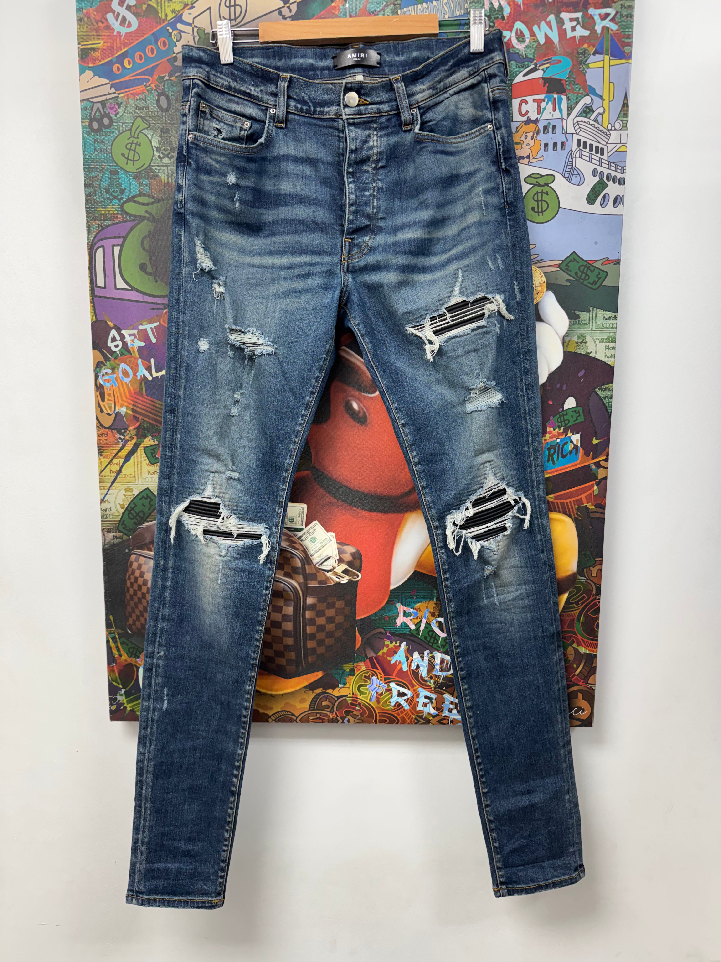 Amiri MX1 Dark Wash Black Patch Jeans