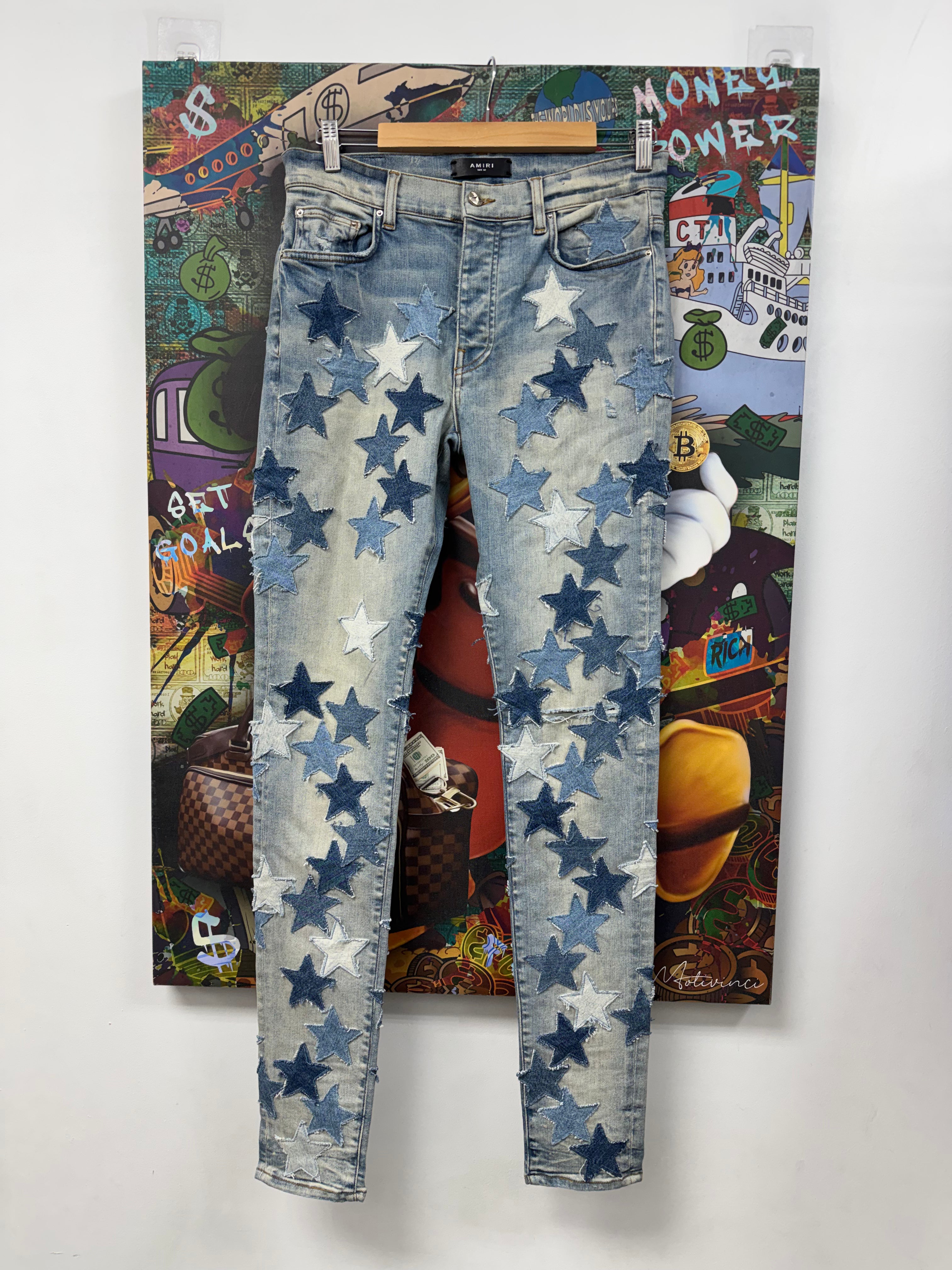 Amiri Light Wash Denim Chemist Stars Jeans