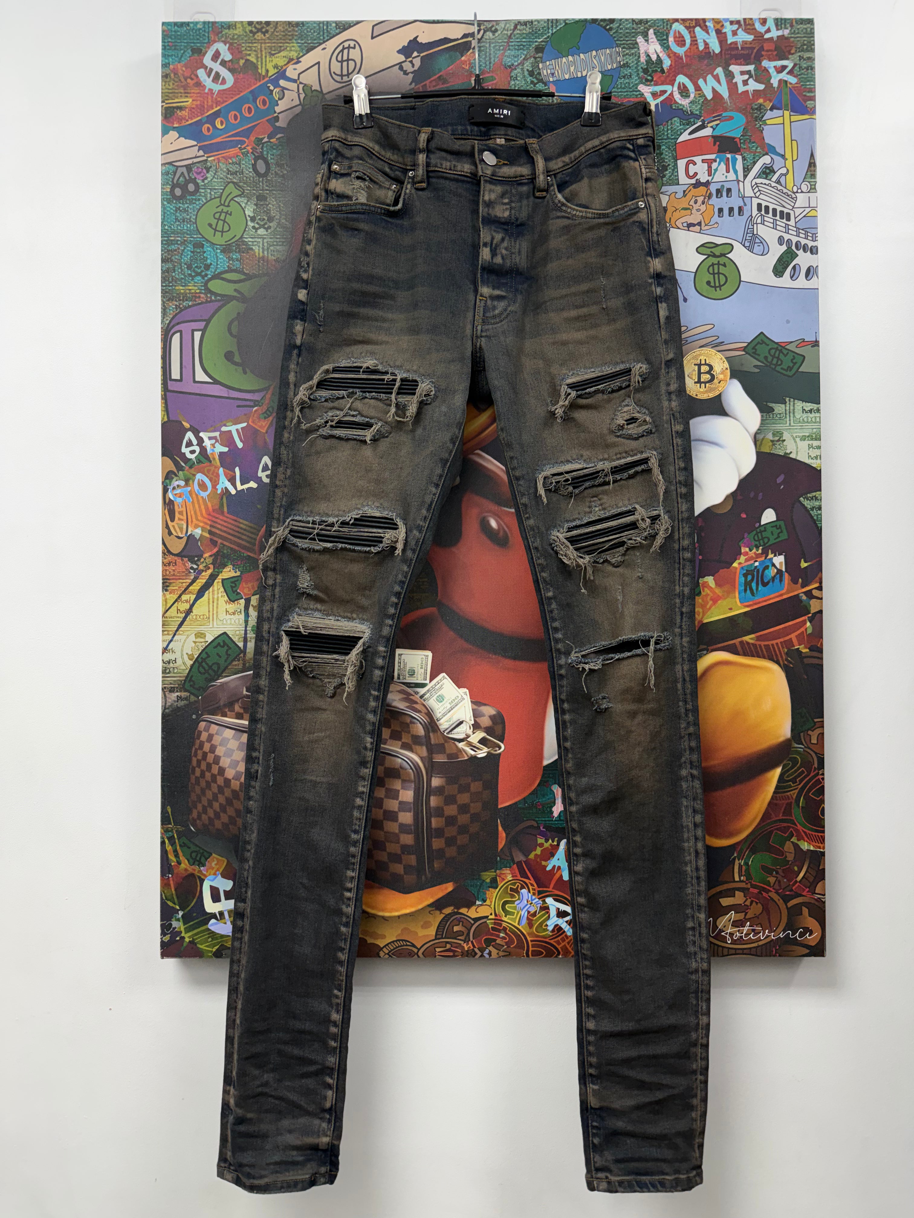 Amiri Dark Indigo Rust Thrasher Patch Jeans