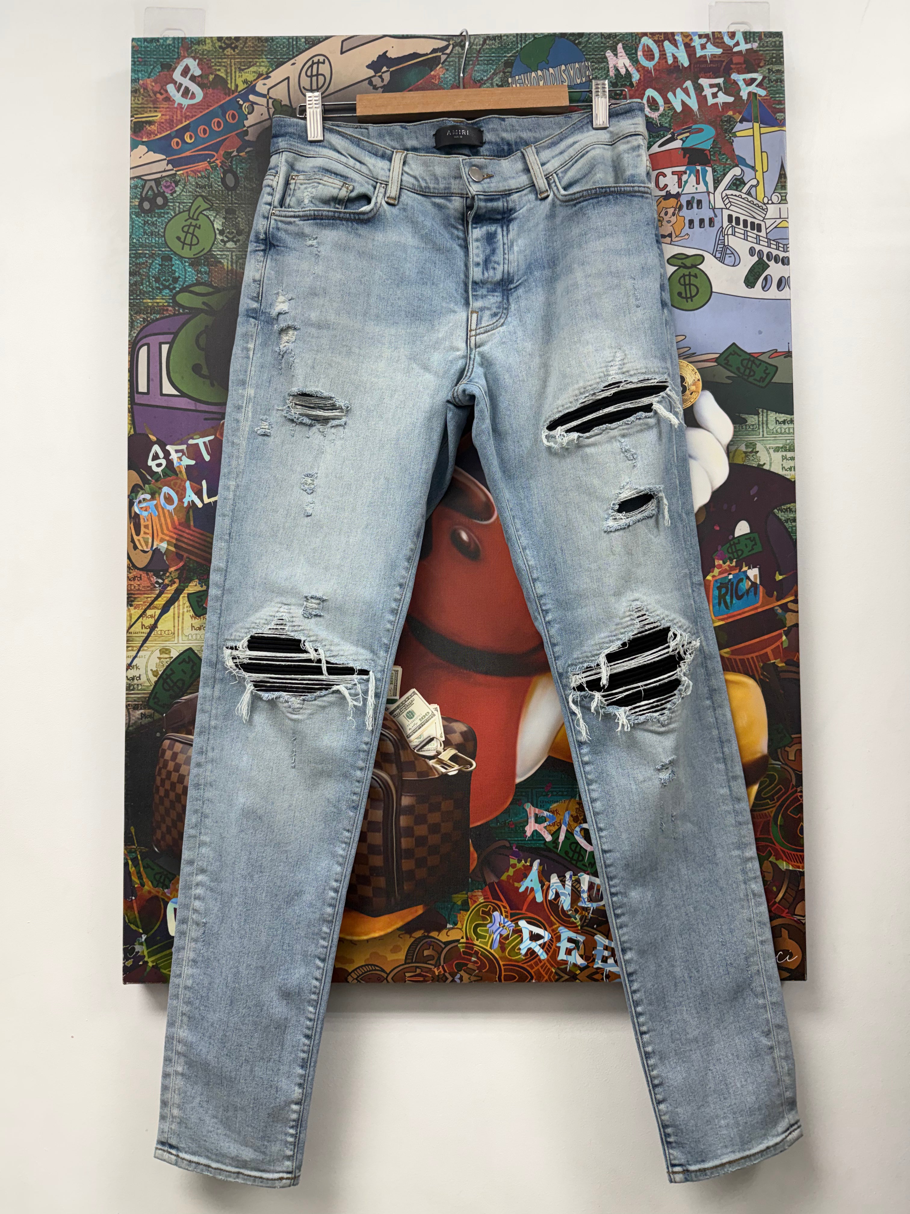 Amiri Light Wash Black Suede Patch Jeans