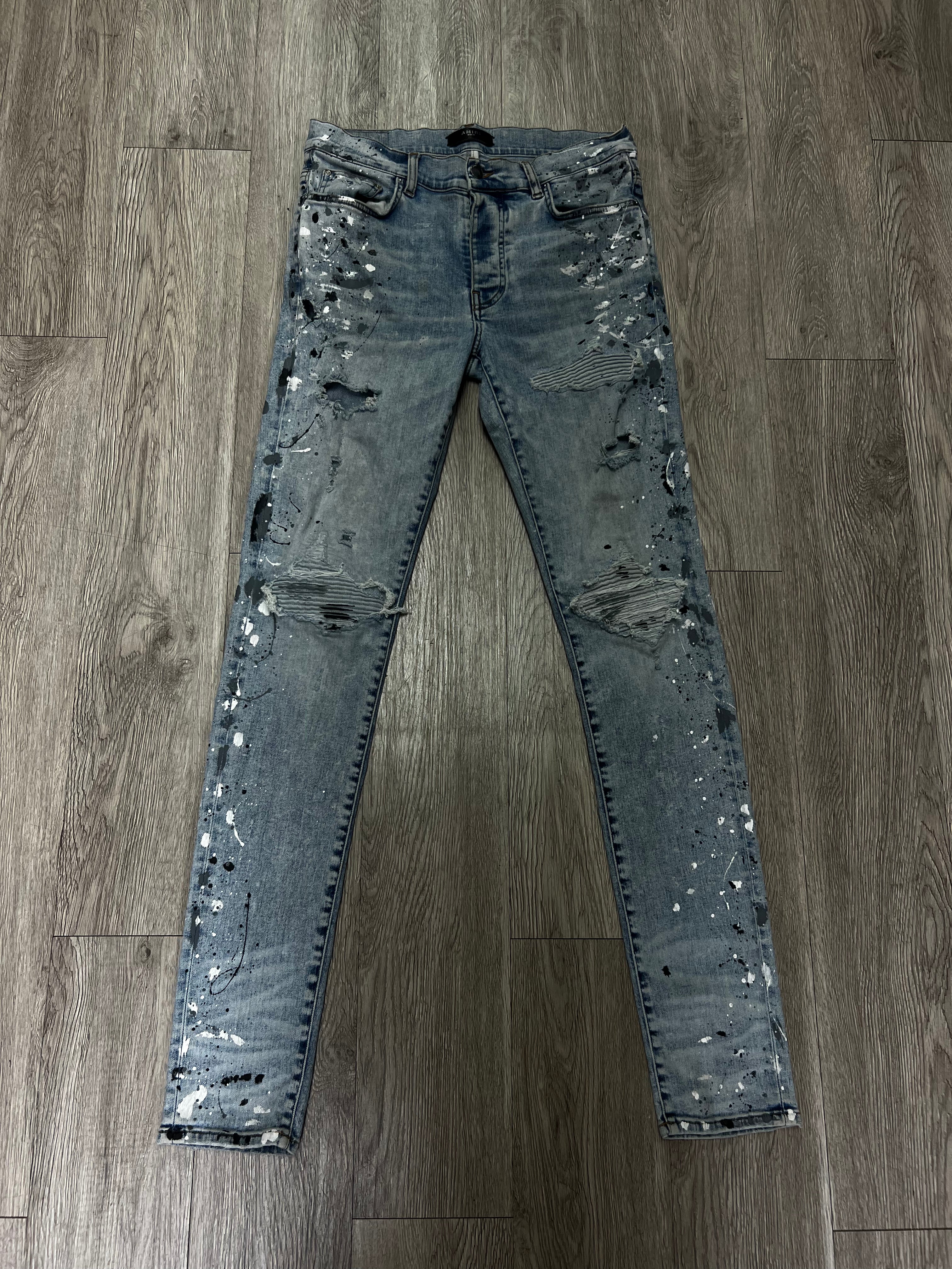 Amiri MX1 Light Wash Denim Splatter Patch Jeans