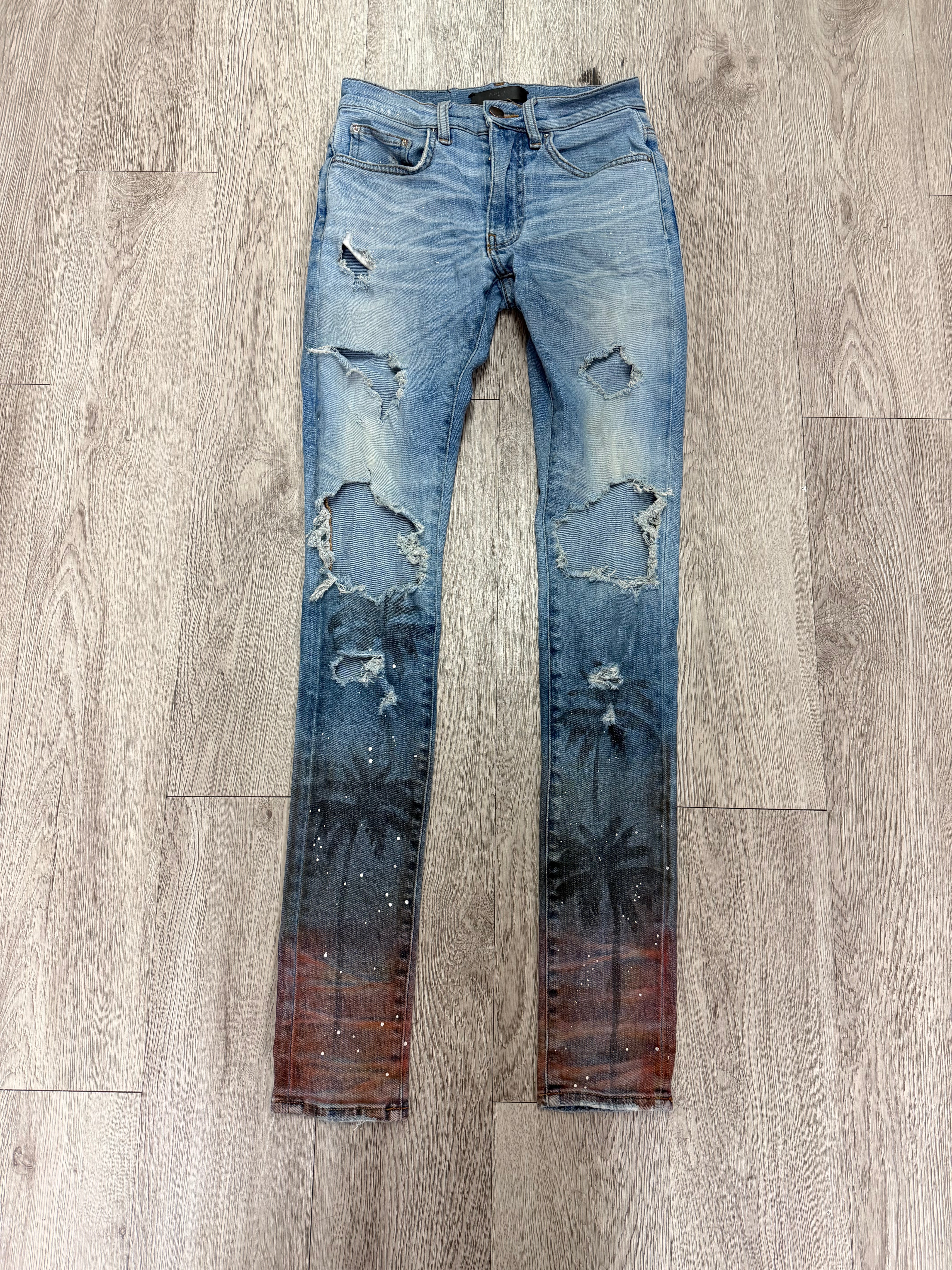 Amiri Light Wash Palm Tree Rripped Jeans