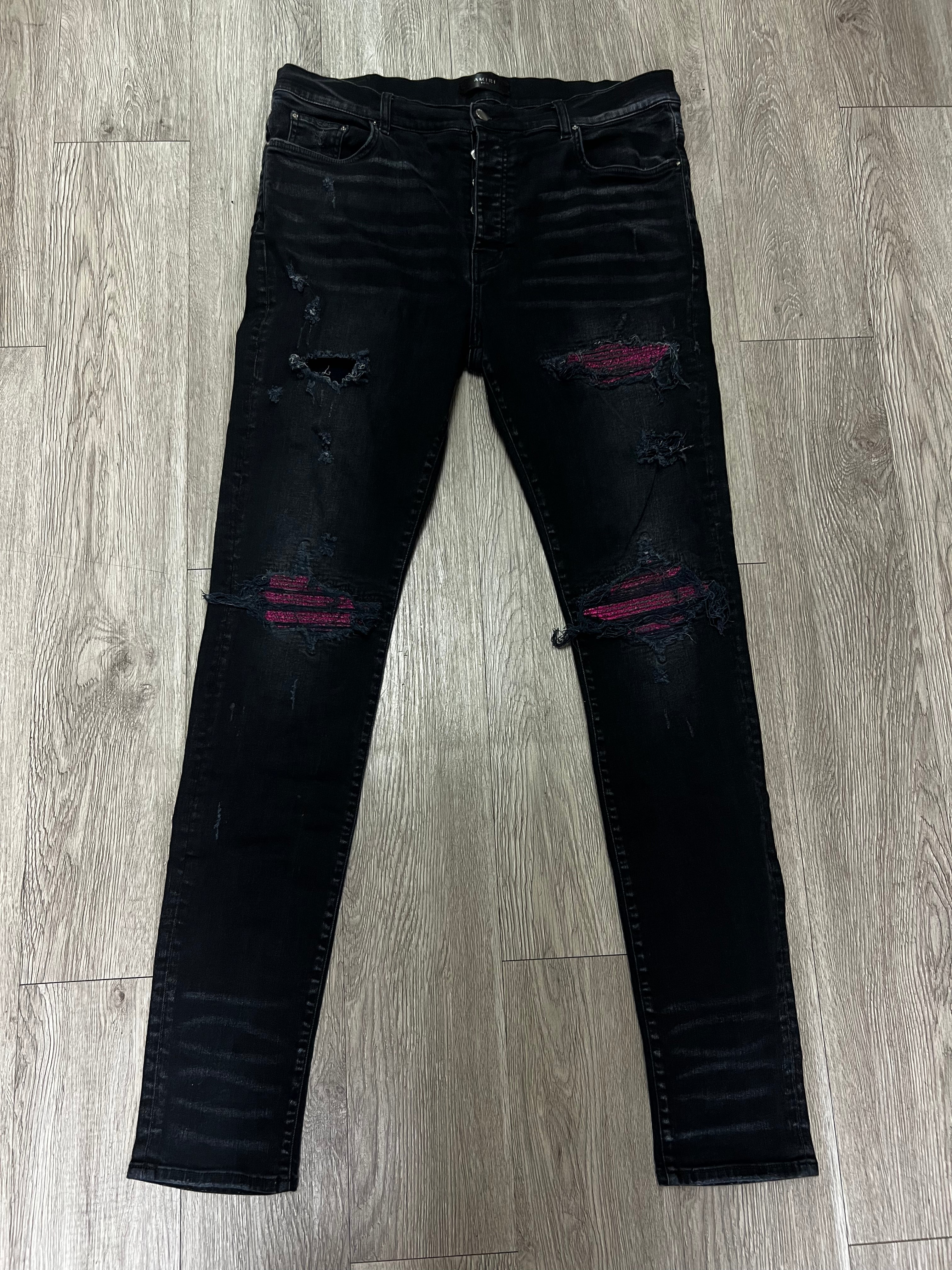 Amiri MX1 Black Wash Pink Crackle Patch Jeans