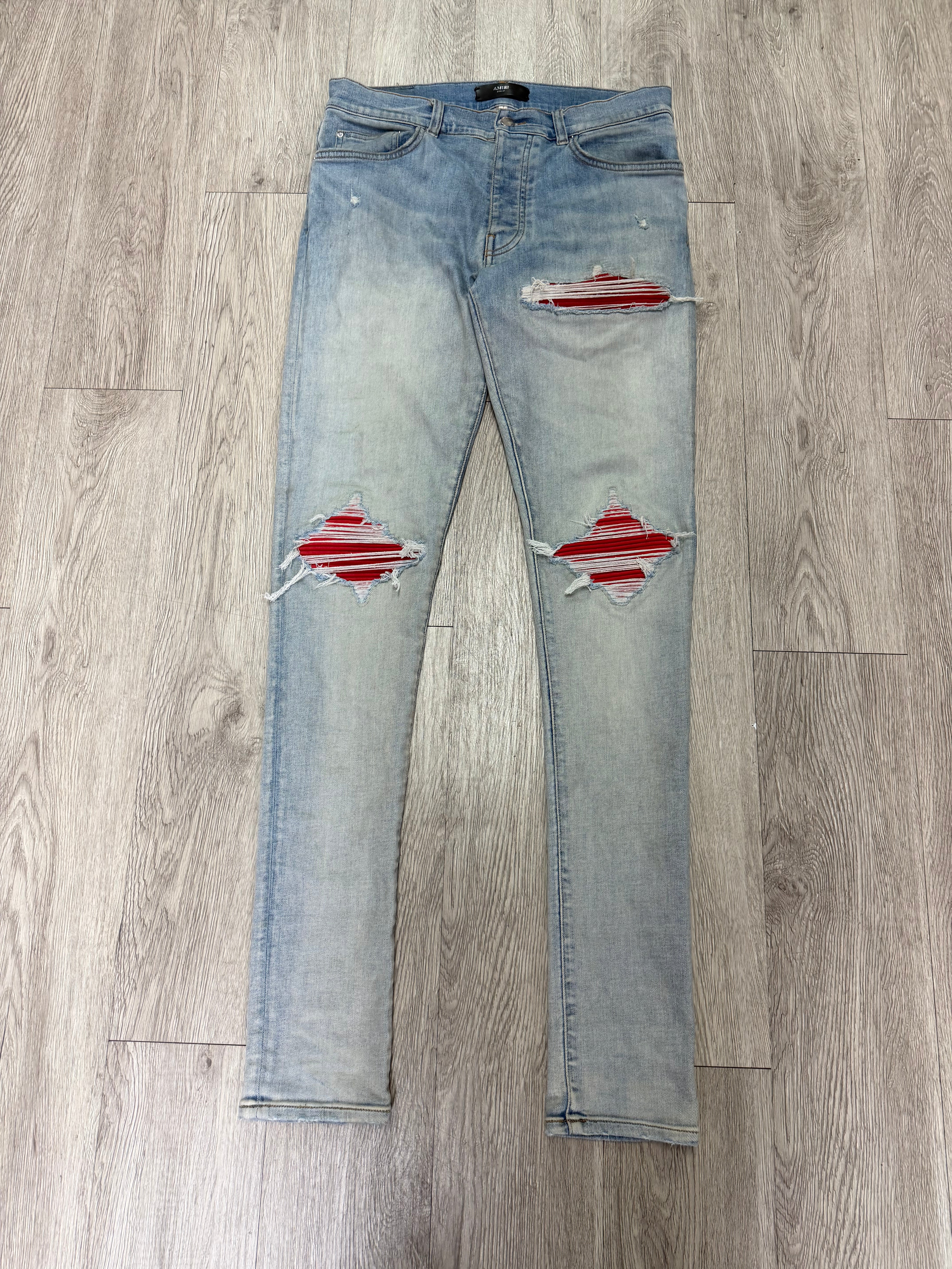 Amiri MX1 Light Wash Red Suede Patch Jeans