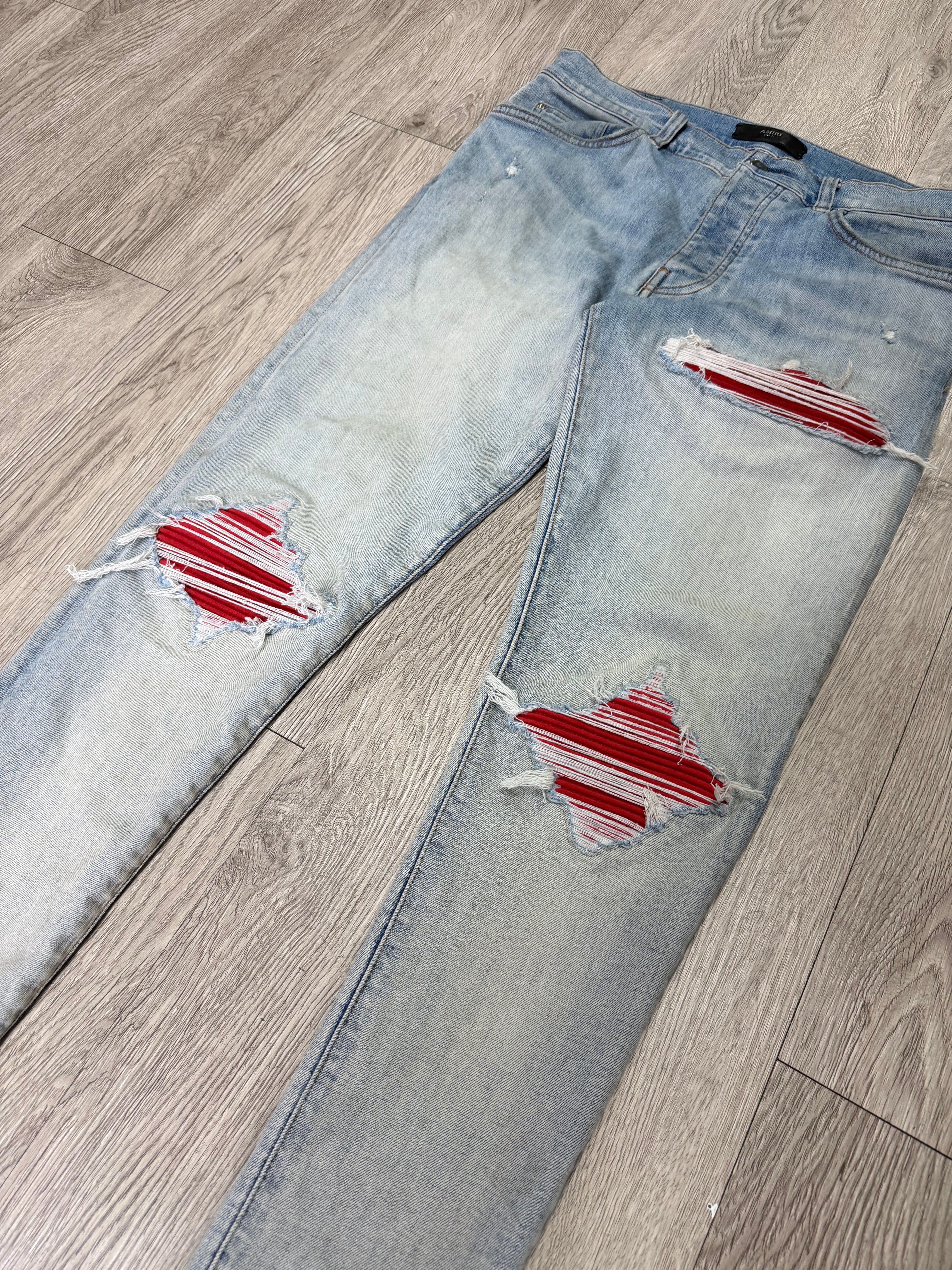 Amiri MX1 Light Wash Red Suede Patch Jeans