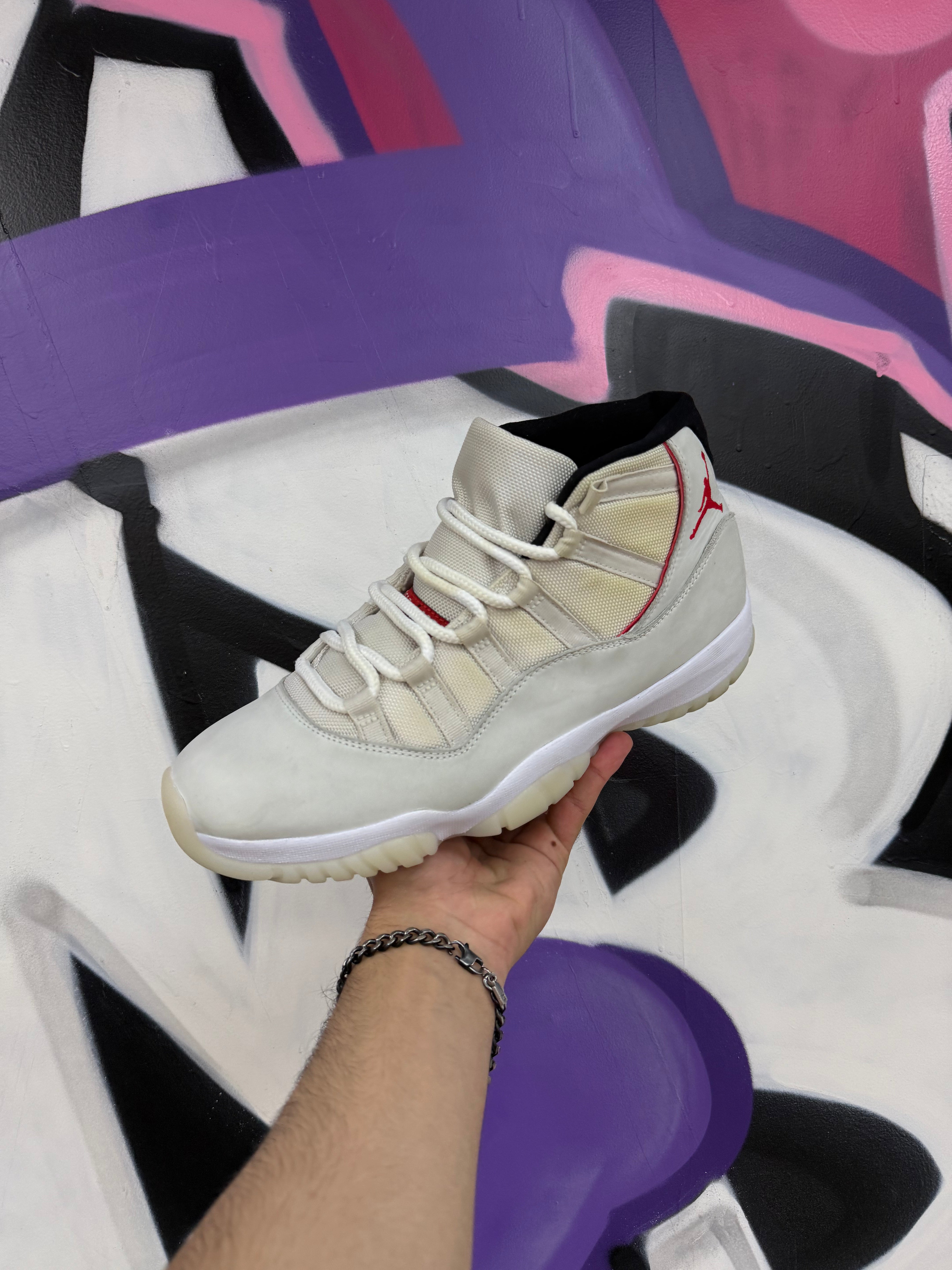 Jordan 11 Platinum Tint Sneakers