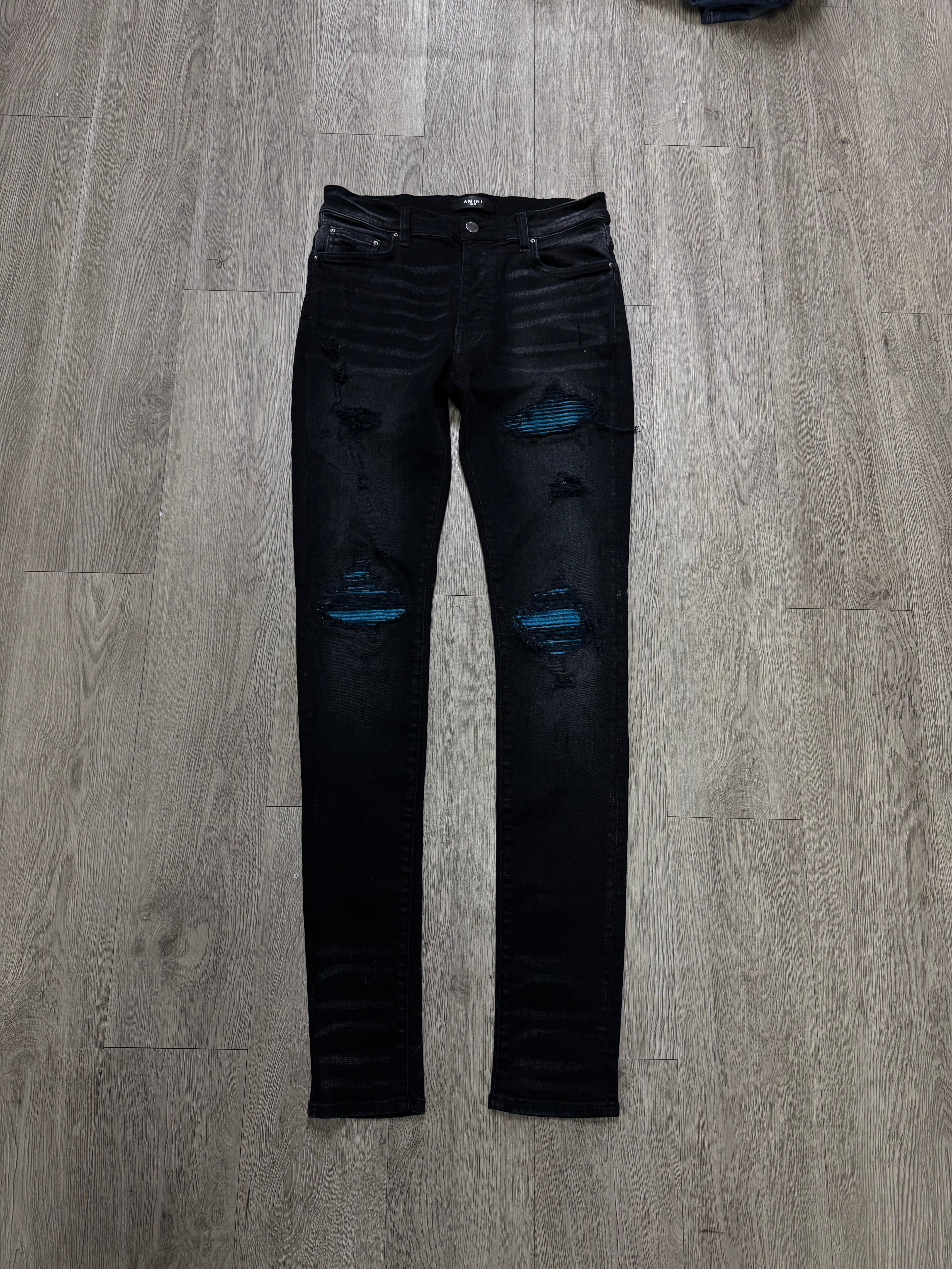 Amiri MX1 Black Wash Crackle Patch Jeans