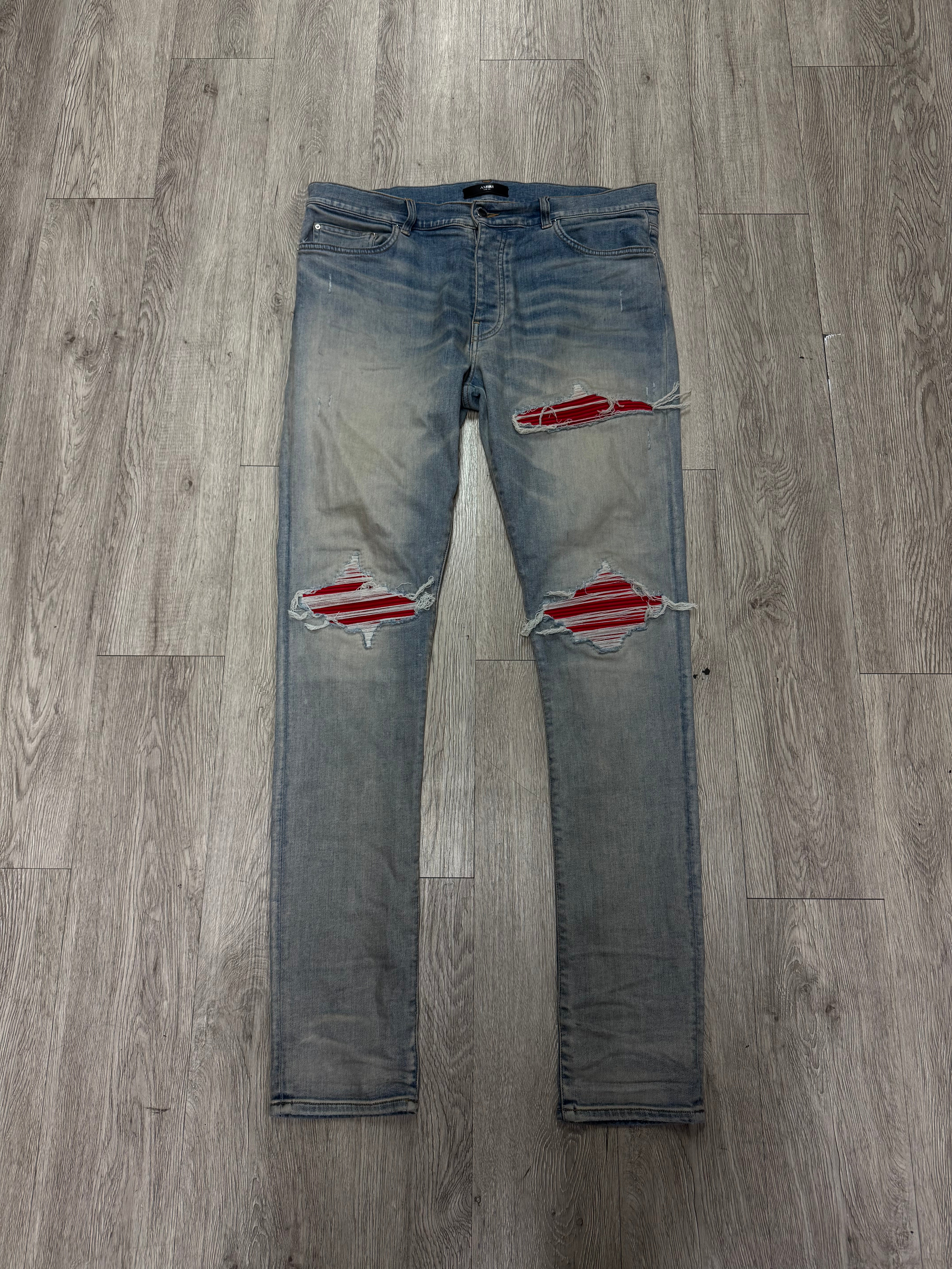 Amiri MX1 Light Wash Red Suede Patch Jeans