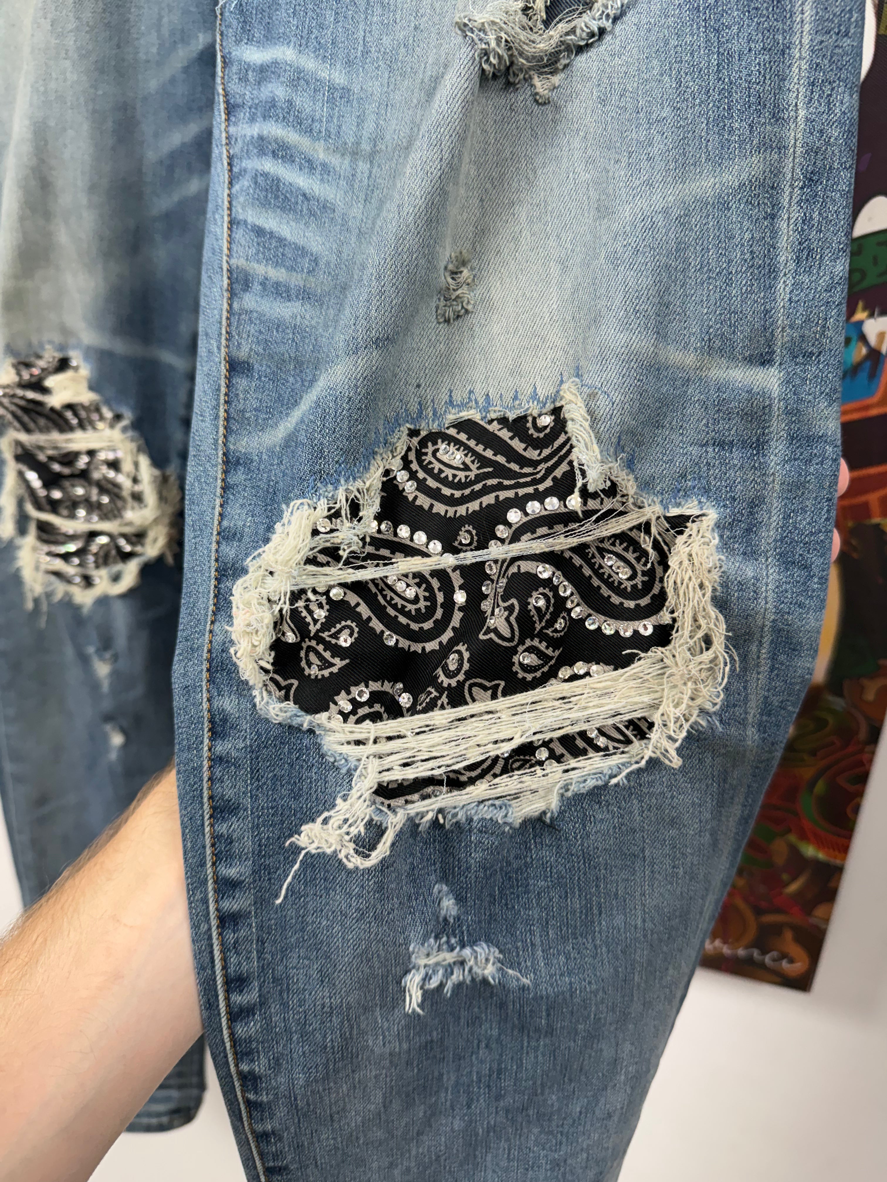 Amiri MX1 Light Wash Music Patch Jeans