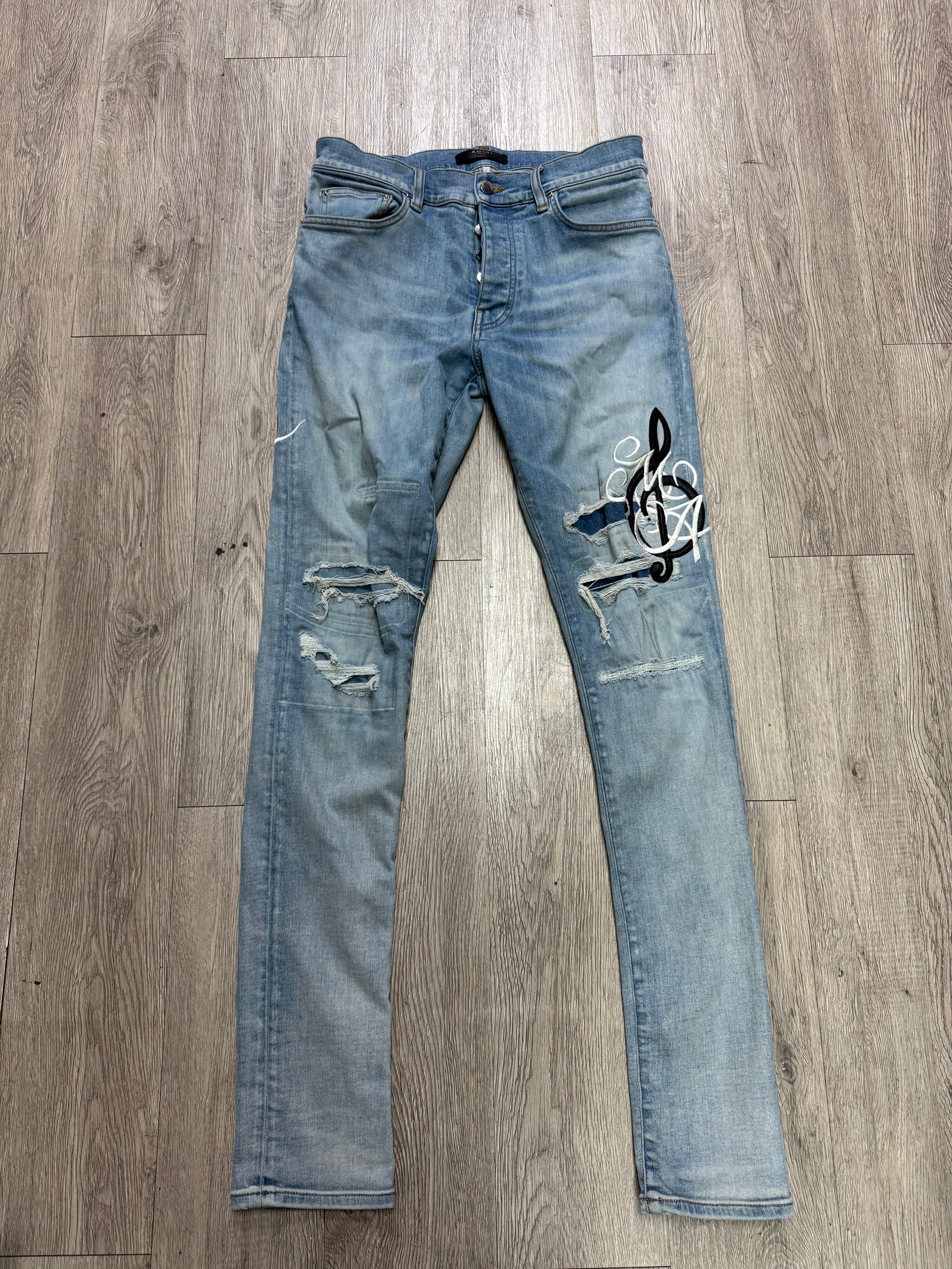 Amiri Light Wash Music Note Jeans