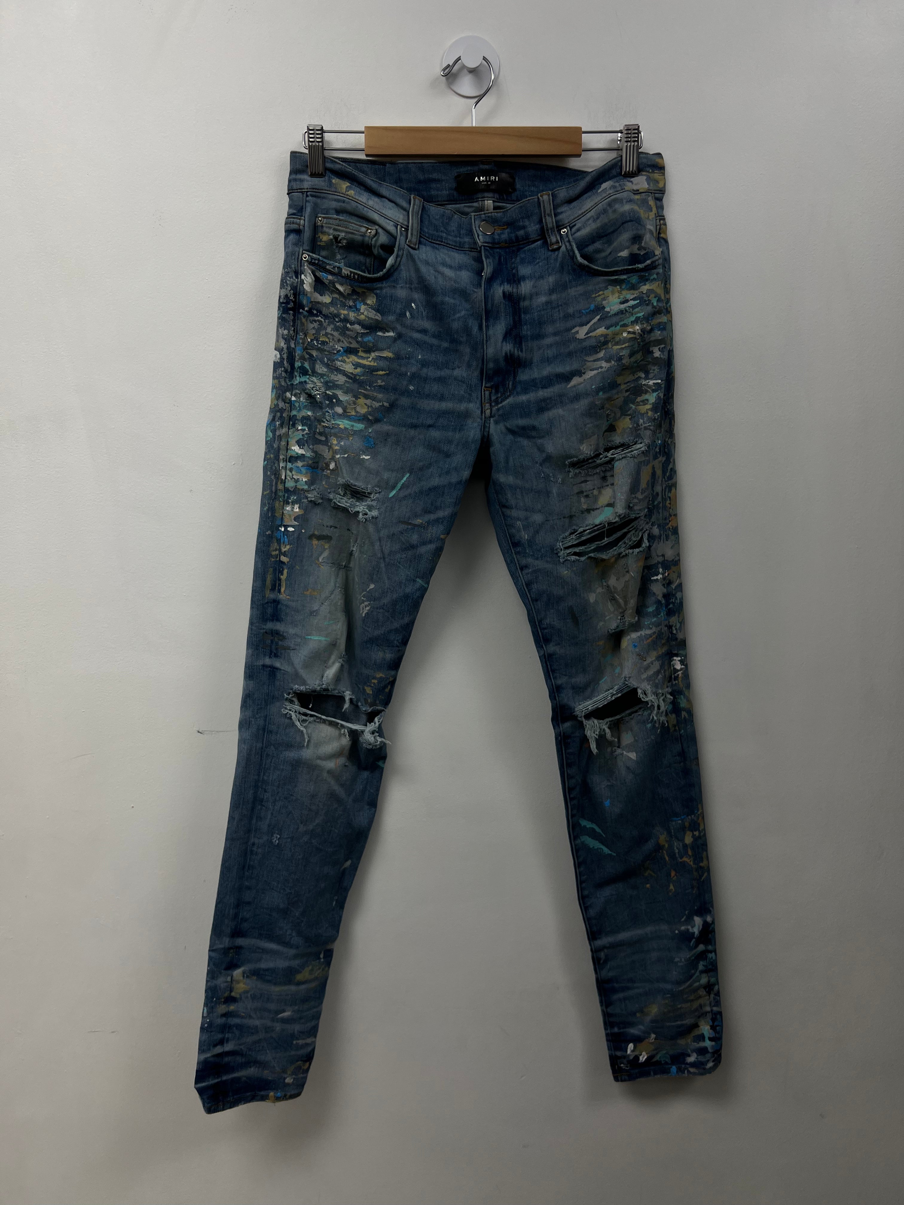 Amiri Light Wash Paint Splatter Jeans