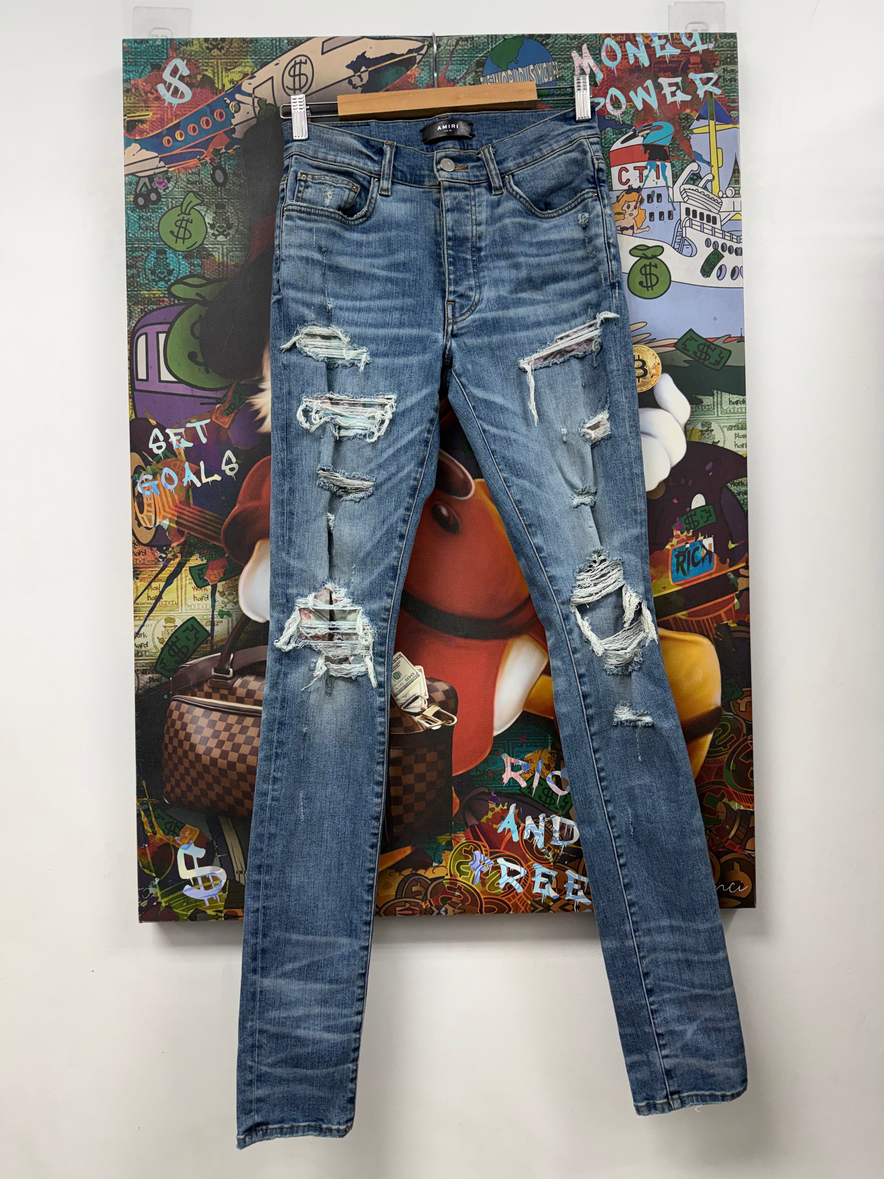Amiri Light Wash Floral Thrasher Patch Jeans