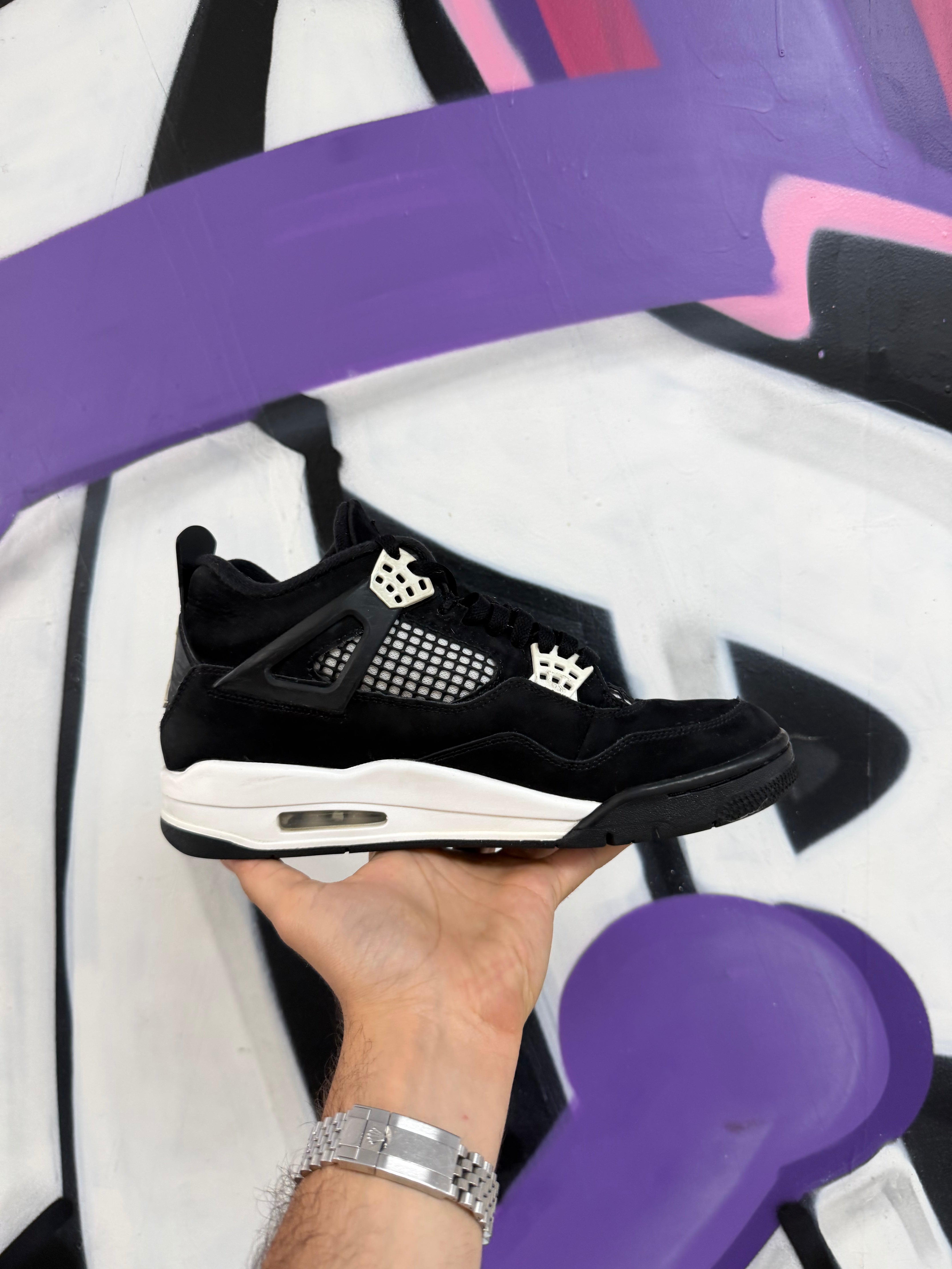 Jordan 4 Thunder Black & White Sneakers