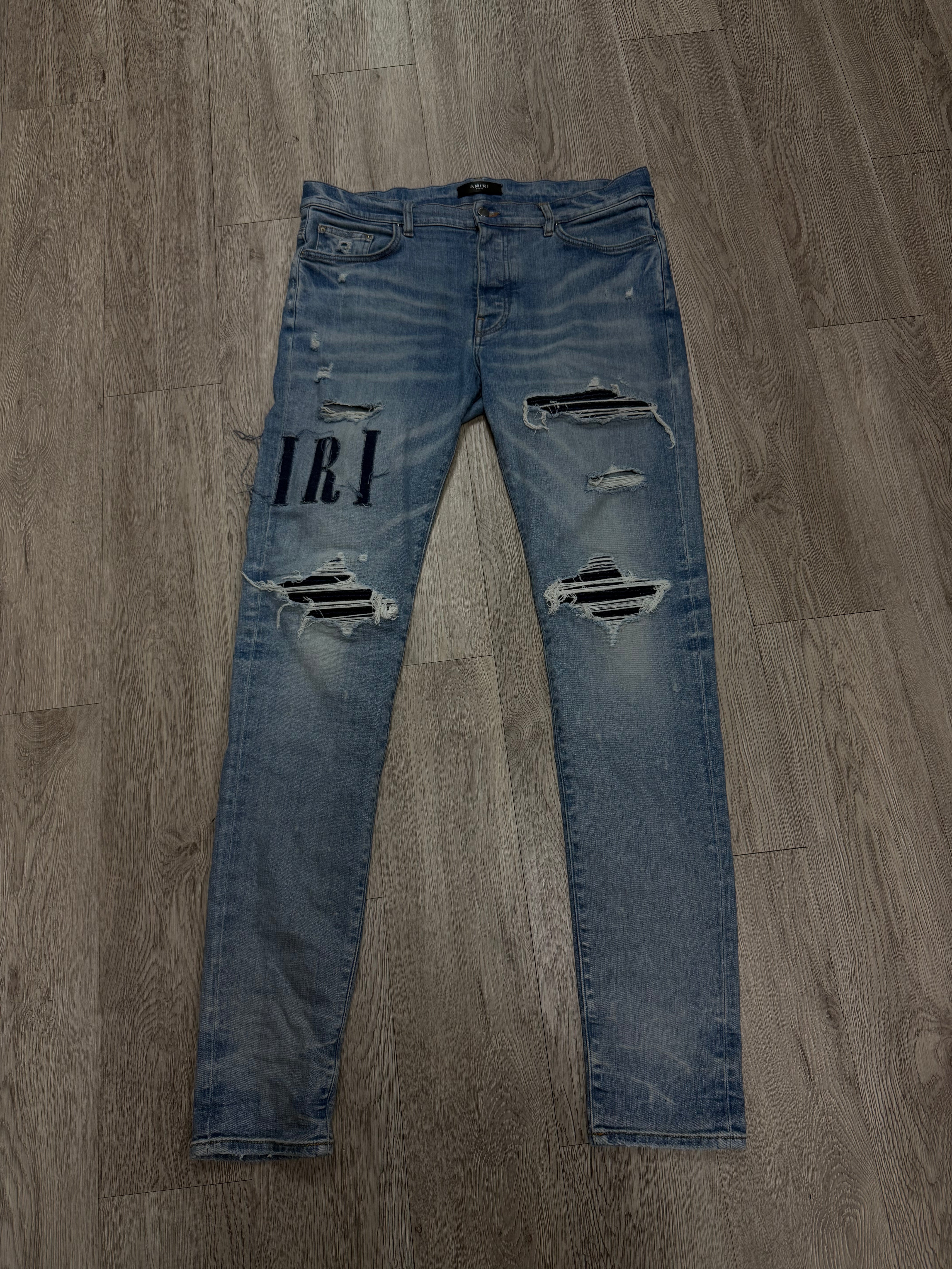 Amiri Light Wash Denim Logo Jean