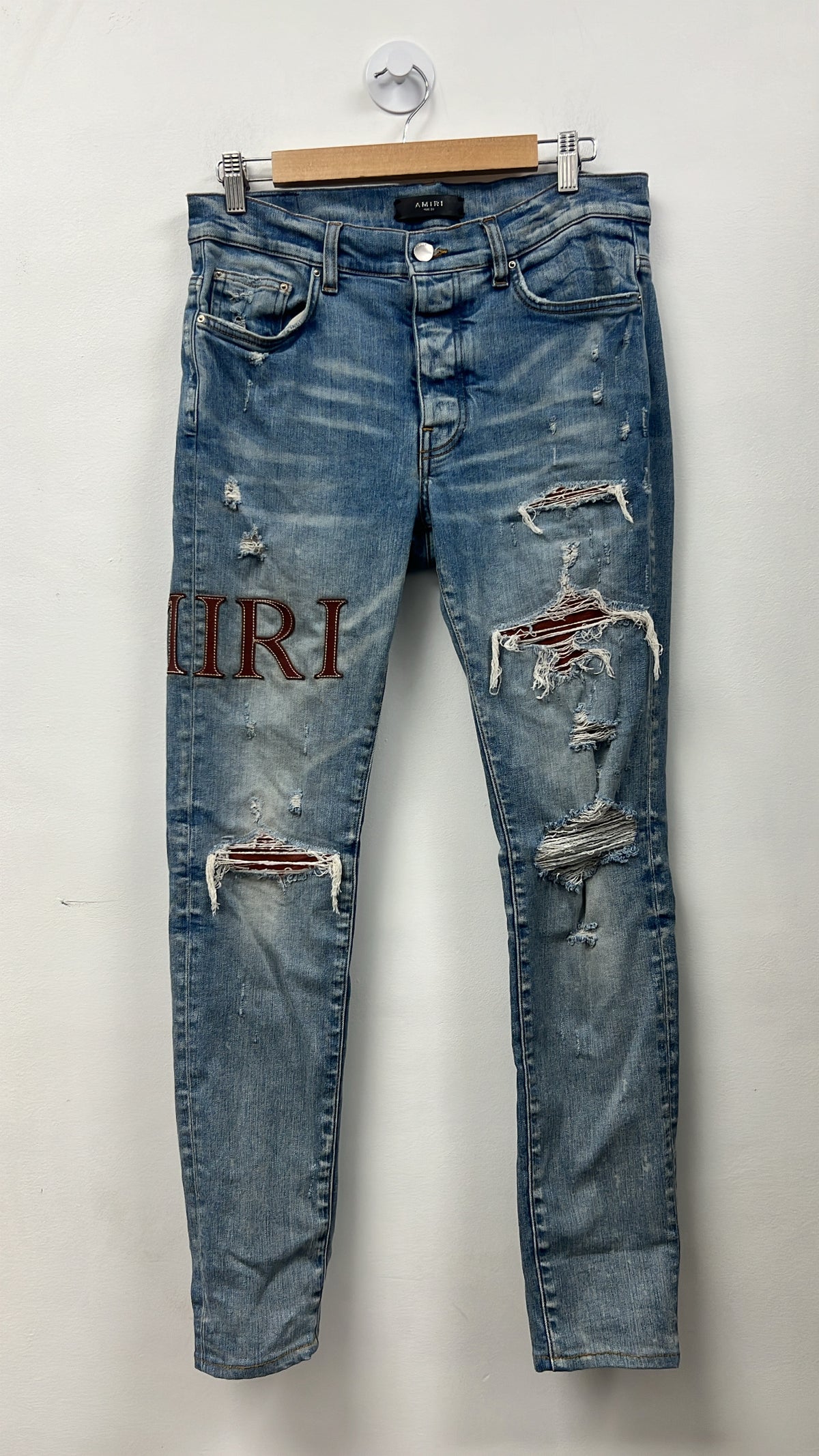 Amiri Light Wash Clay Side Logo Jeans
