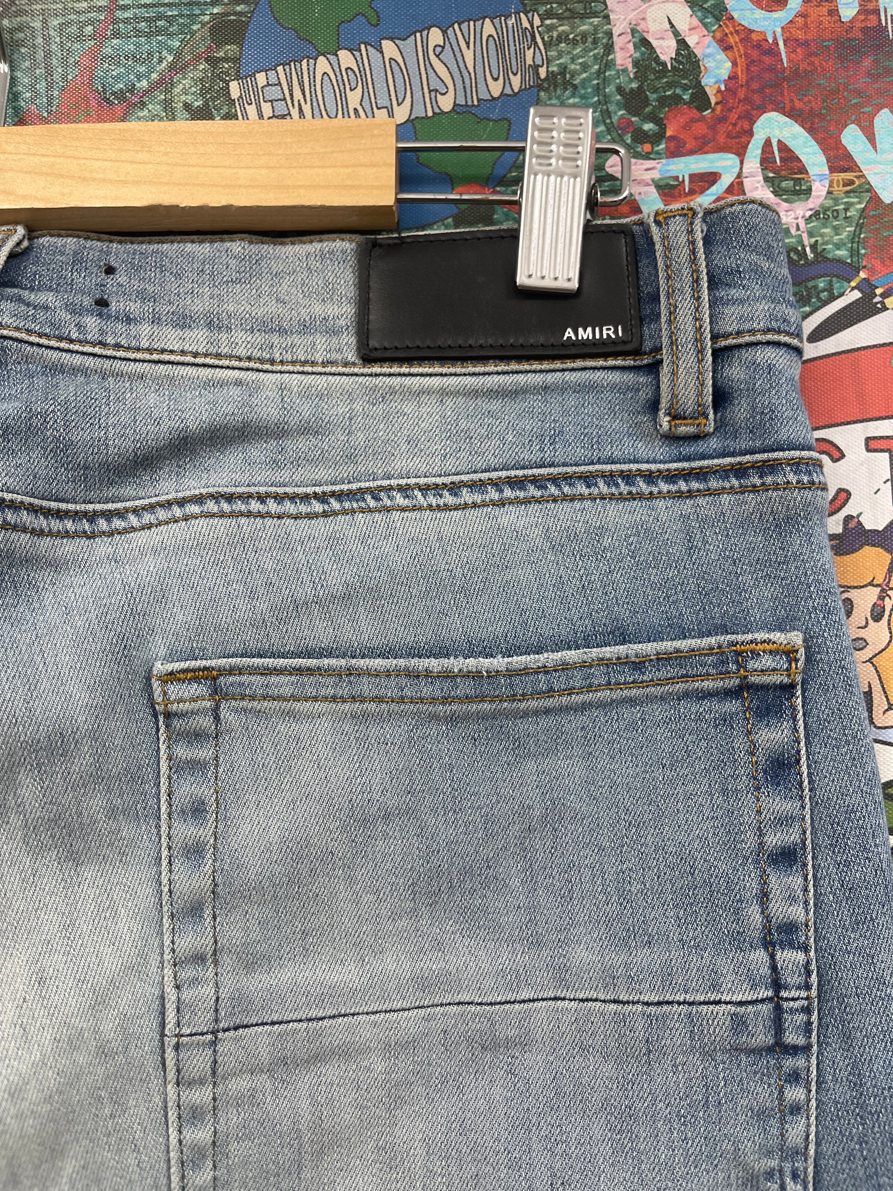 Amiri MX1 Light Wash Black Leather Patch (Zipper) Jeans
