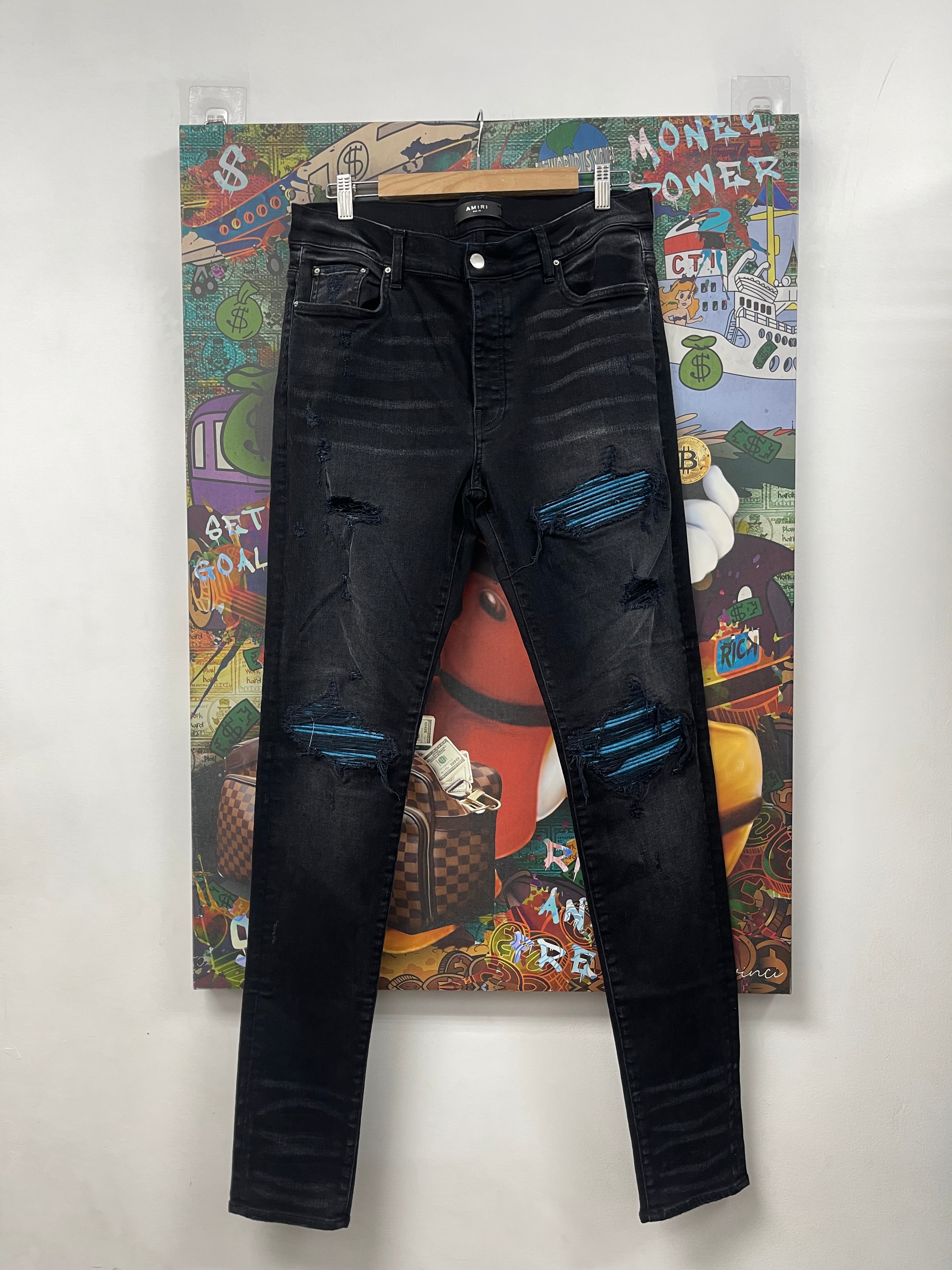 Amiri MX1 Black Wash Blue Crackle Patch Jeans